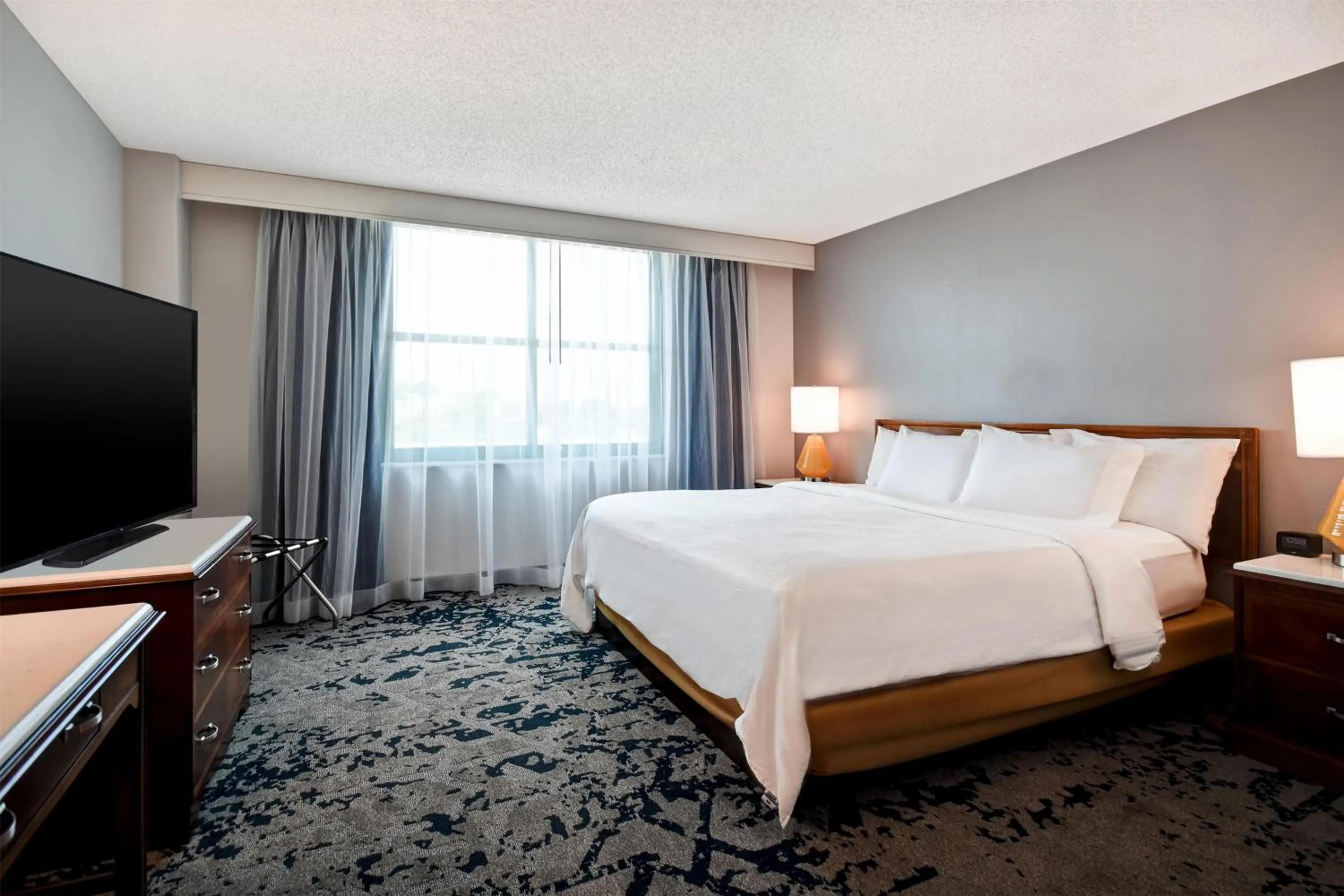 Bed in Embassy Suites Montgomery - Hotel & Conference Center