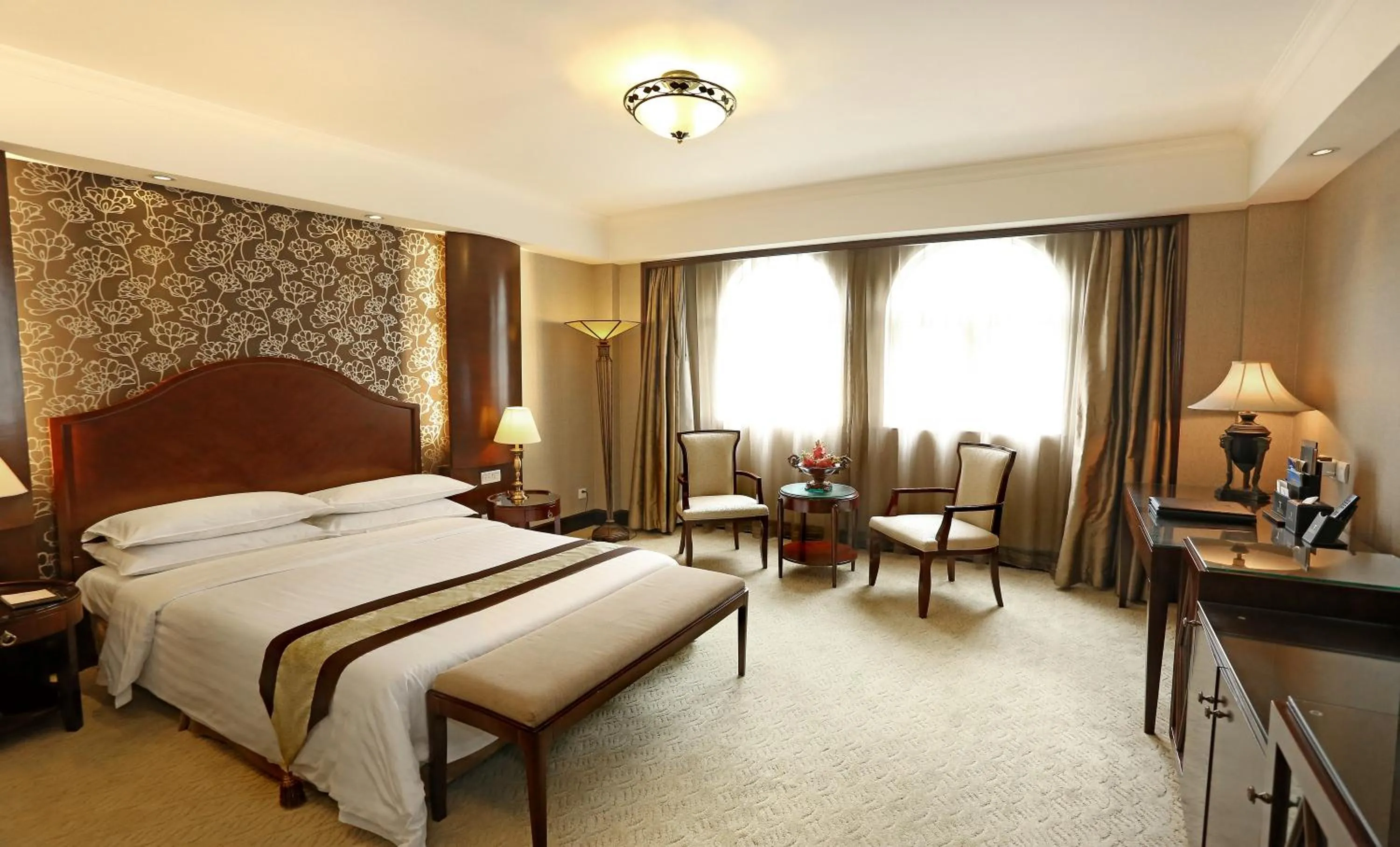 Bed in Grand Palace Hotel - Grand Hotel Management Group