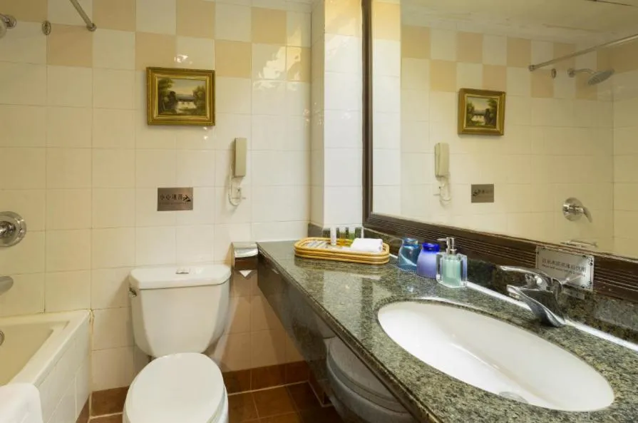 Bathroom in Grand Palace Hotel - Grand Hotel Management Group