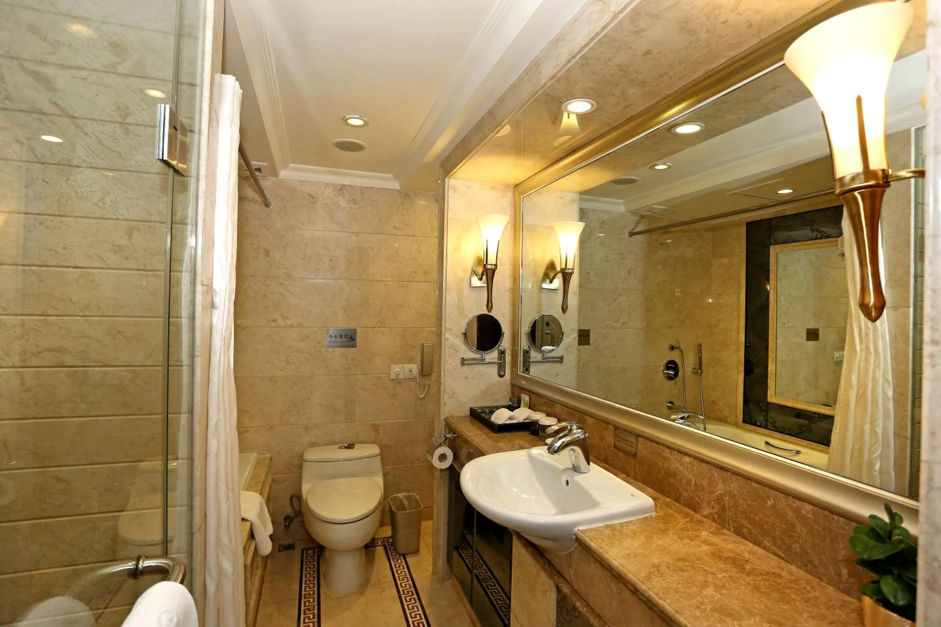 Bathroom in Grand Palace Hotel - Grand Hotel Management Group