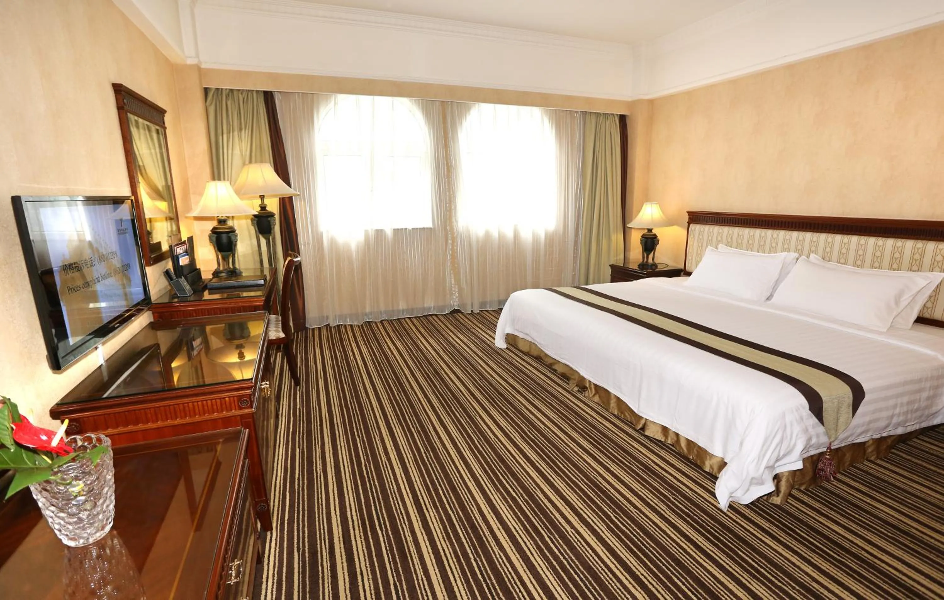 Bed in Grand Palace Hotel - Grand Hotel Management Group
