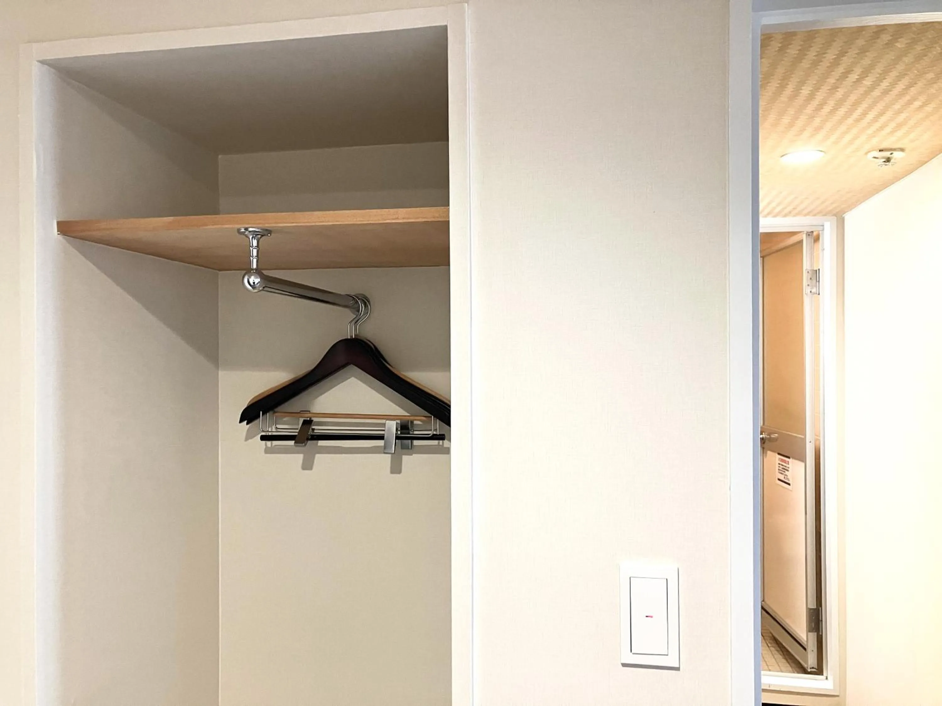 wardrobe in HOTEL LiVEMAX BUDGET Iyo Mishima