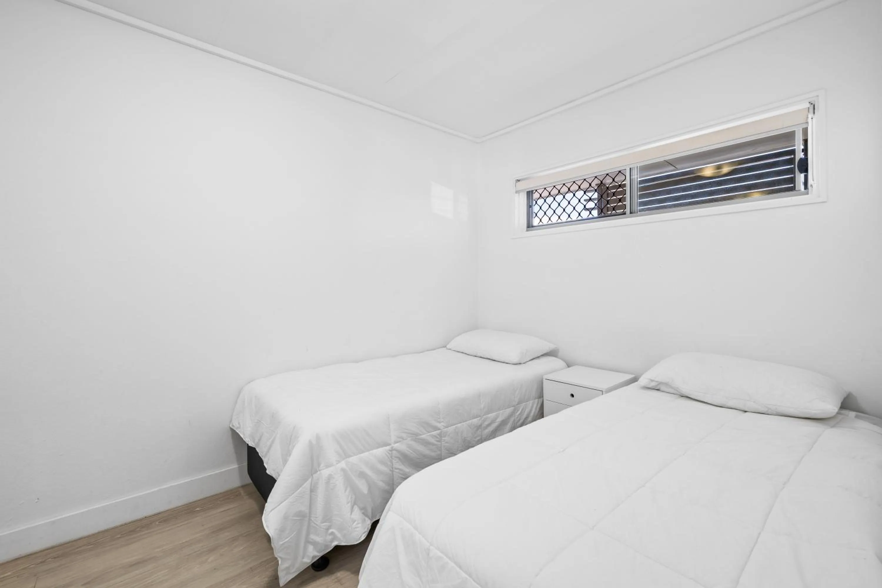 Bed in Maroochy Sands Holiday Apartments