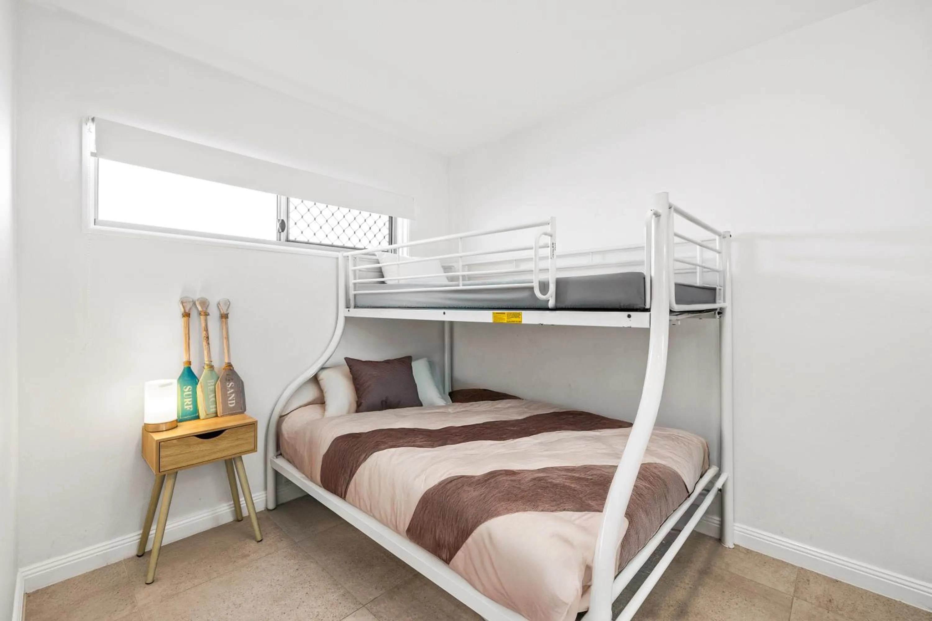 Bed in Maroochy Sands Holiday Apartments