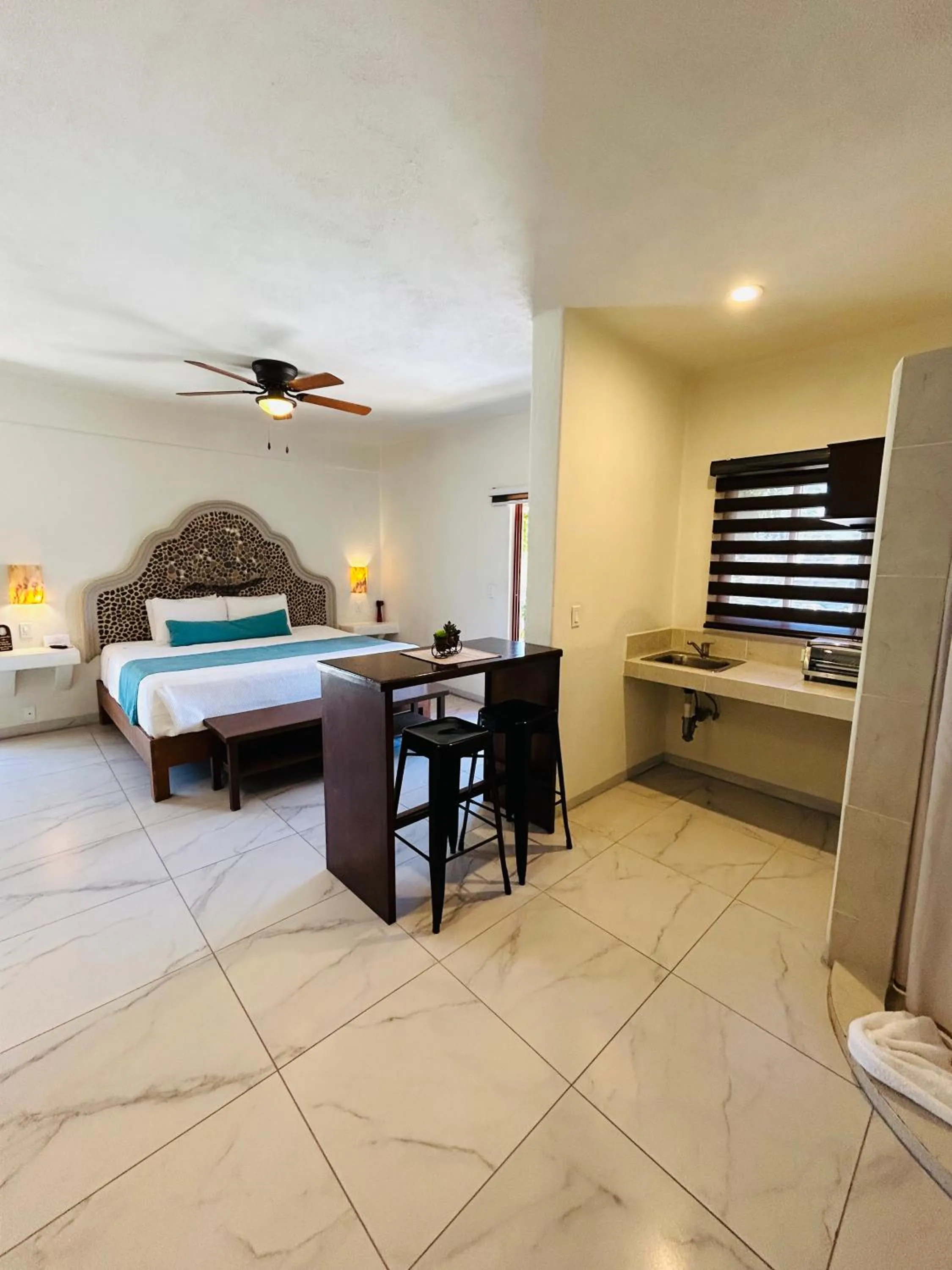 Bed in Paraiso Azul Hotel