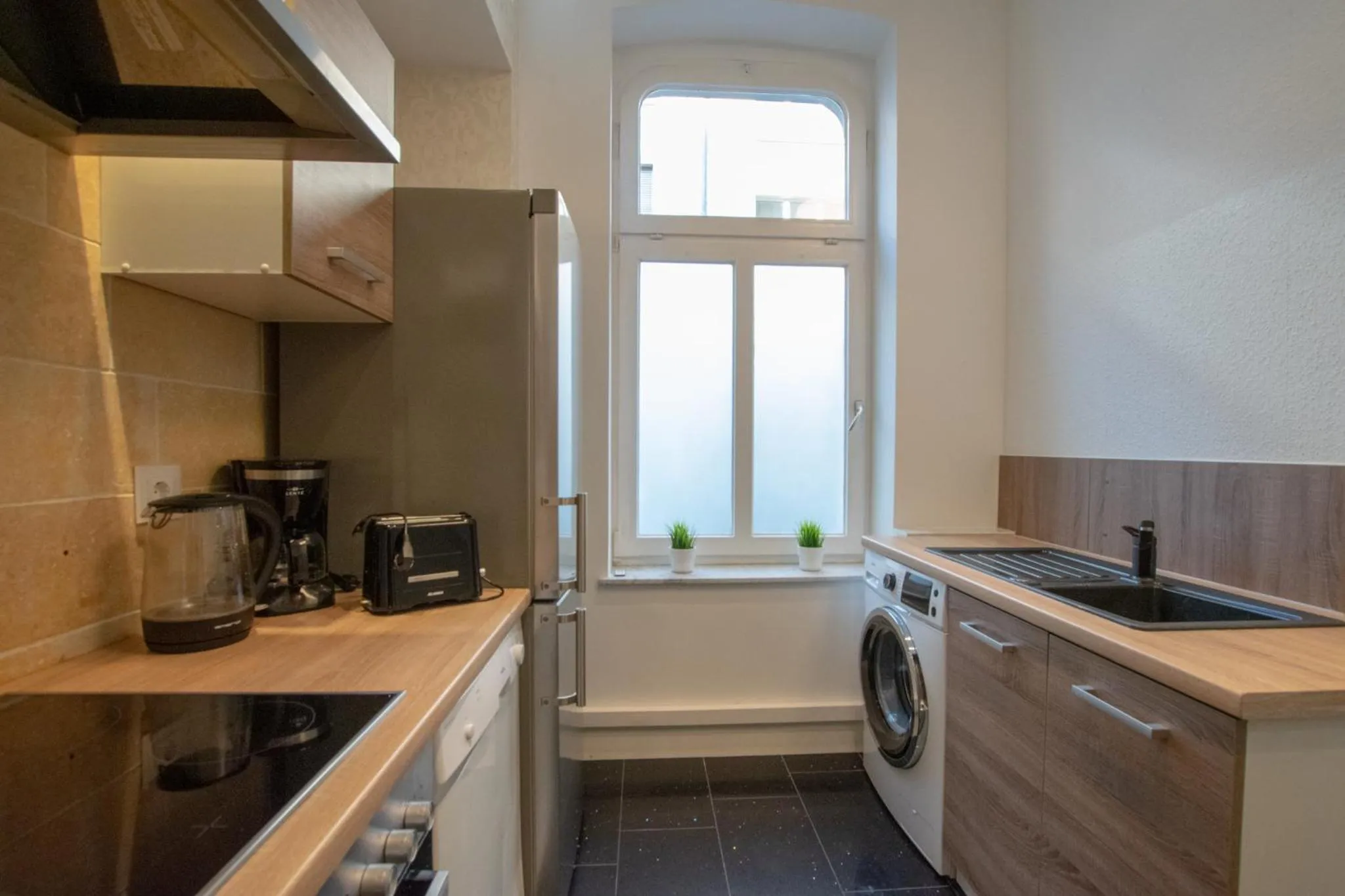 Kitchen or kitchenette in Central City Villa