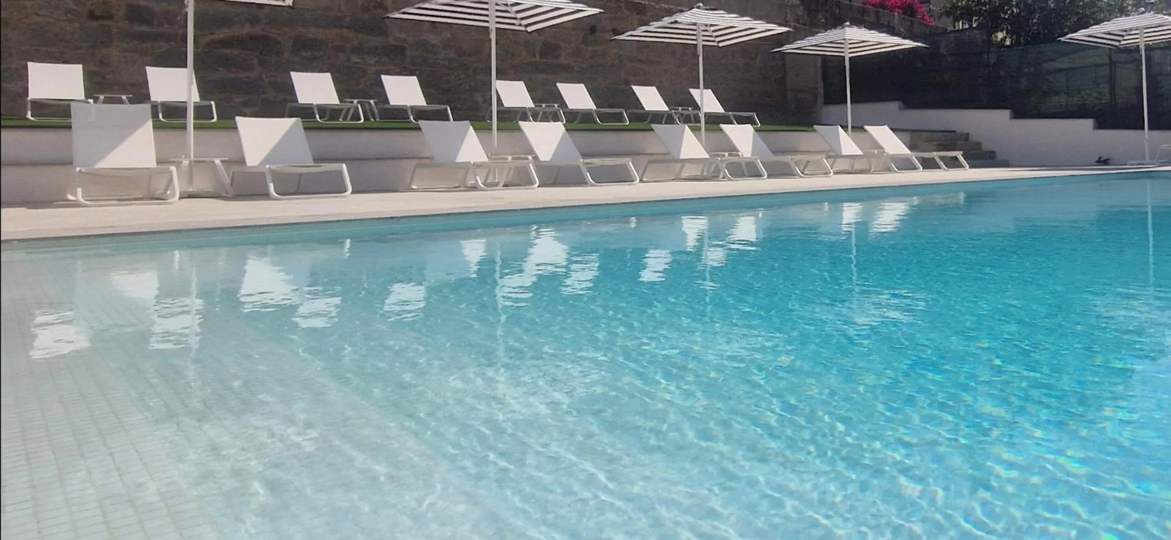 Swimming pool in La Suite Hotel