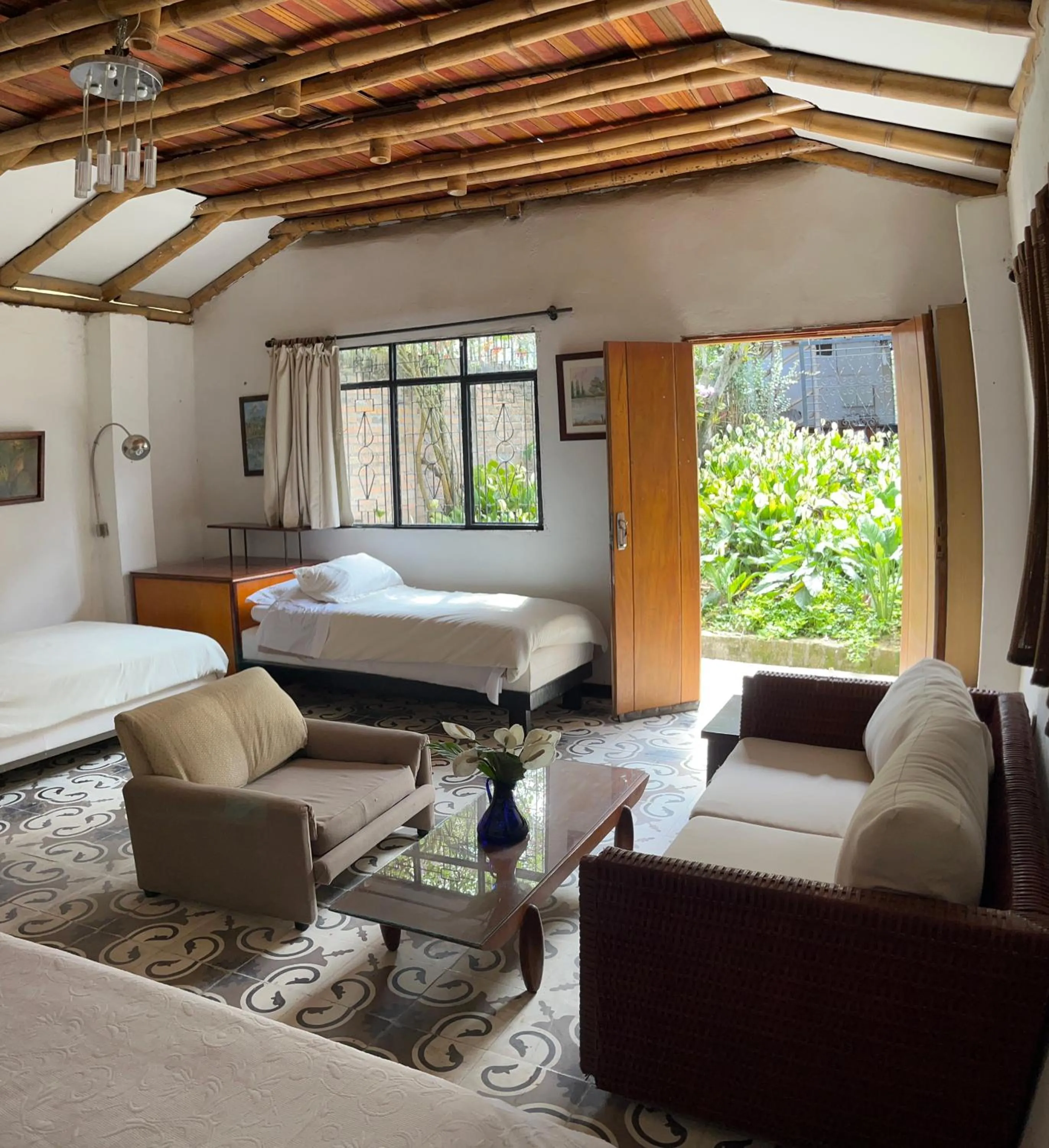 Photo of the whole room, Bed in Casa Carmelita Hotel Boutique Pitalito