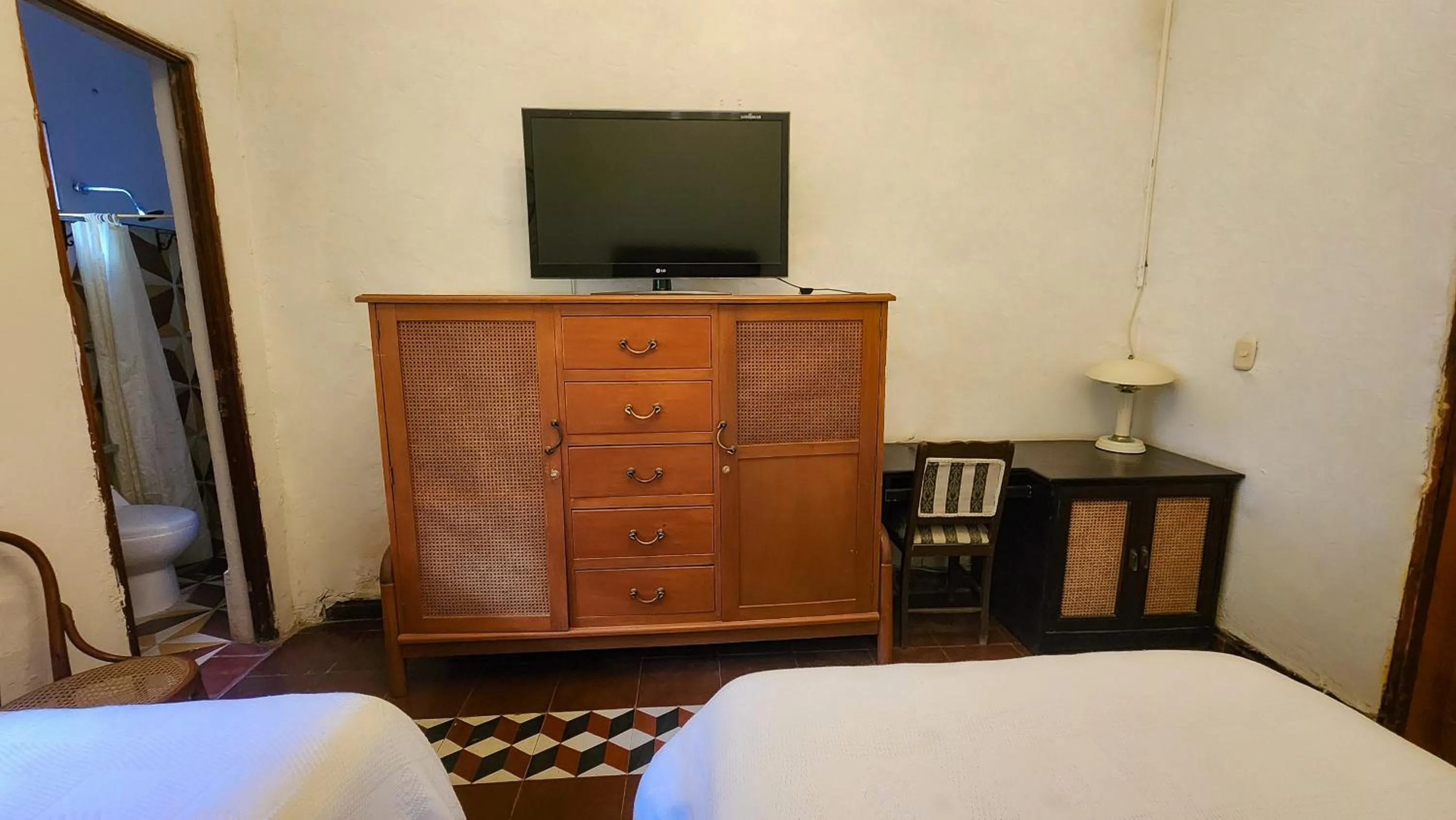 TV and multimedia, Bed in Casa Carmelita Hotel Boutique Pitalito