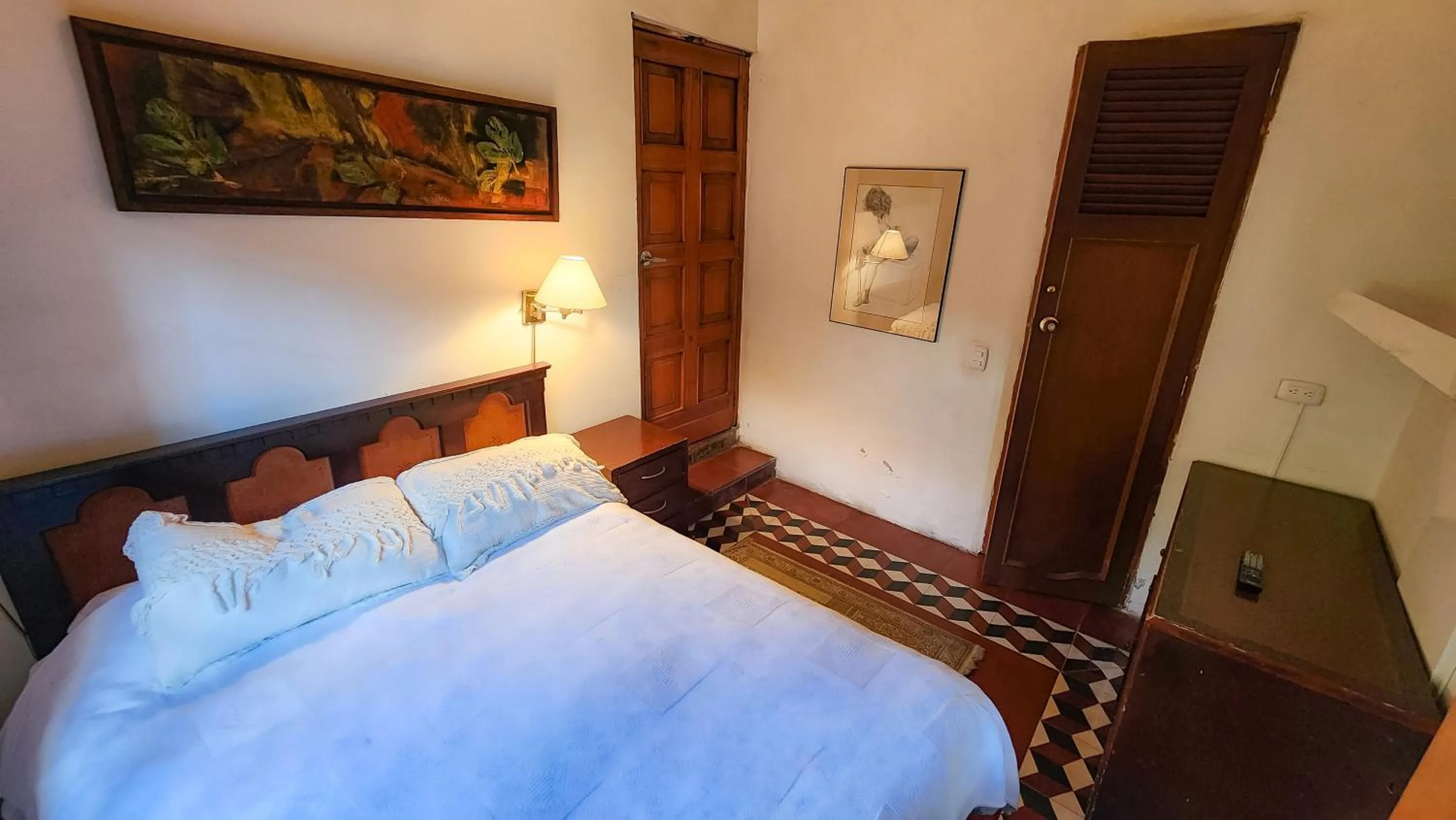 Photo of the whole room, Bed in Casa Carmelita Hotel Boutique Pitalito