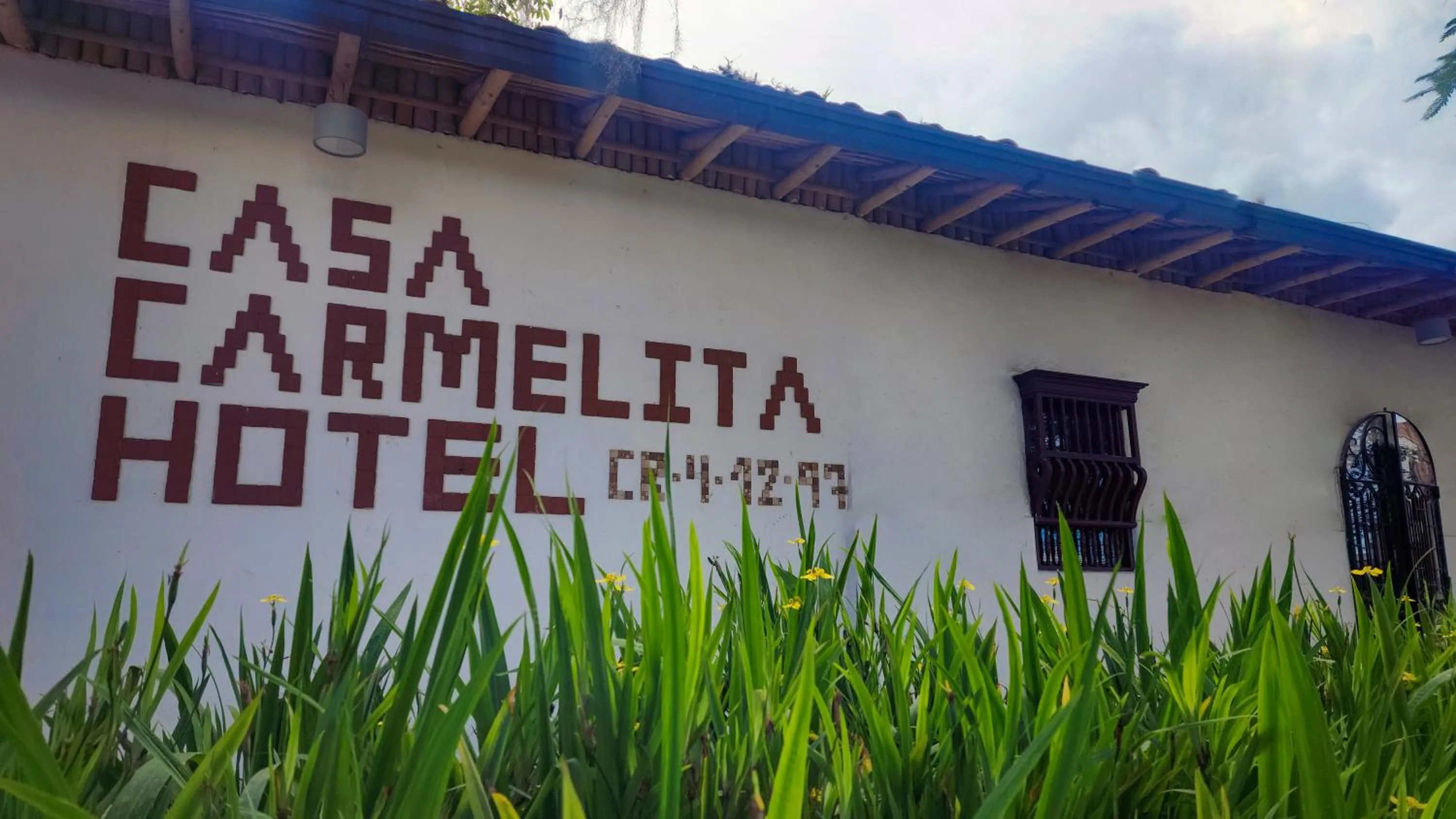 Property building in Casa Carmelita Hotel Boutique Pitalito