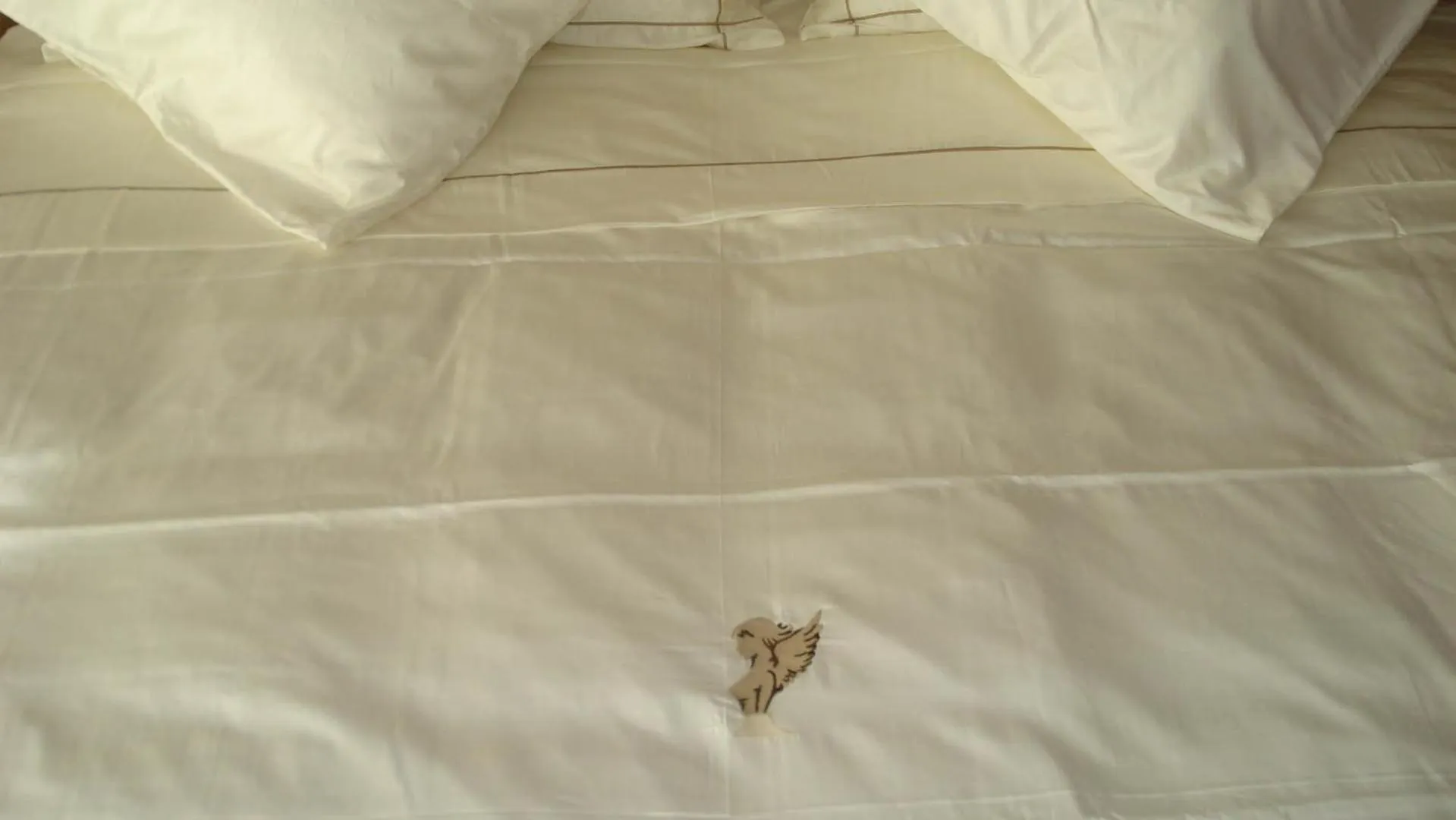 Bed in Hotel Garni Vittoria