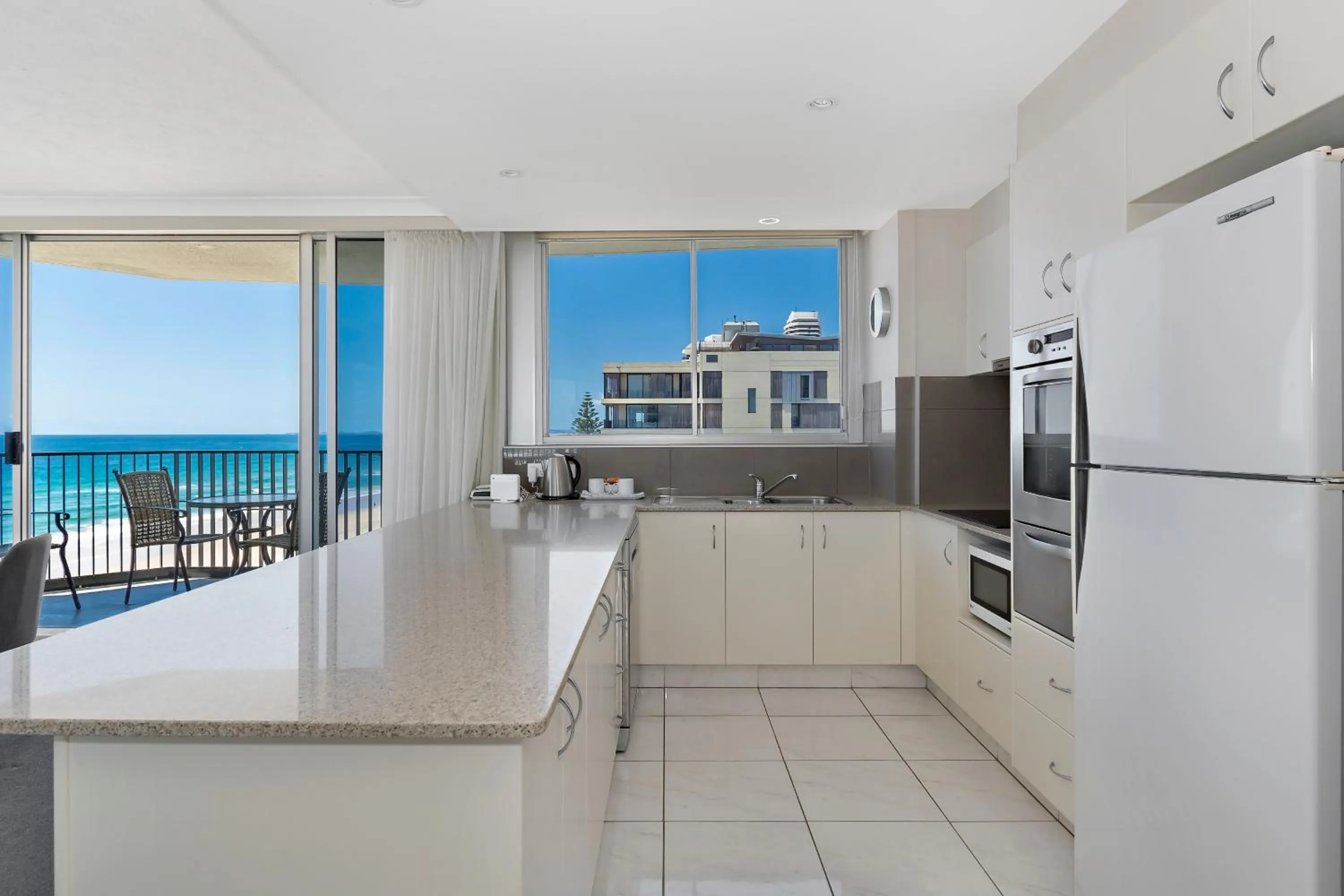 Kitchen or kitchenette in Golden Sands on the Beach - Absolute Beachfront Apartments