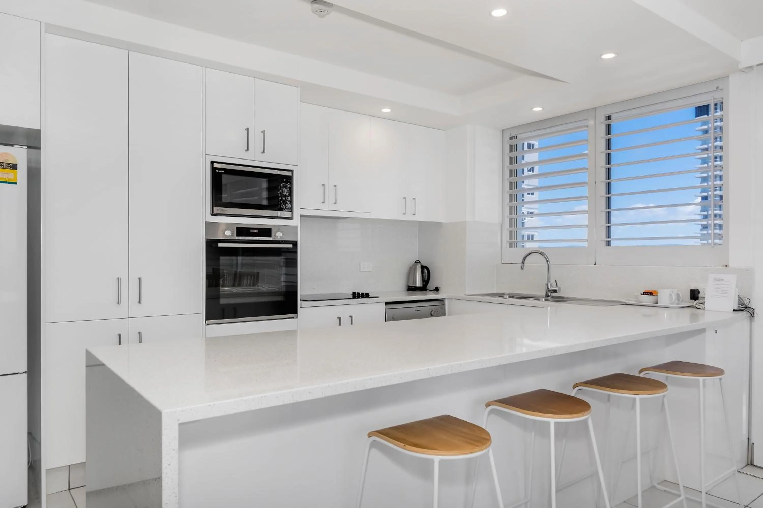 Kitchen or kitchenette in Golden Sands on the Beach - Absolute Beachfront Apartments