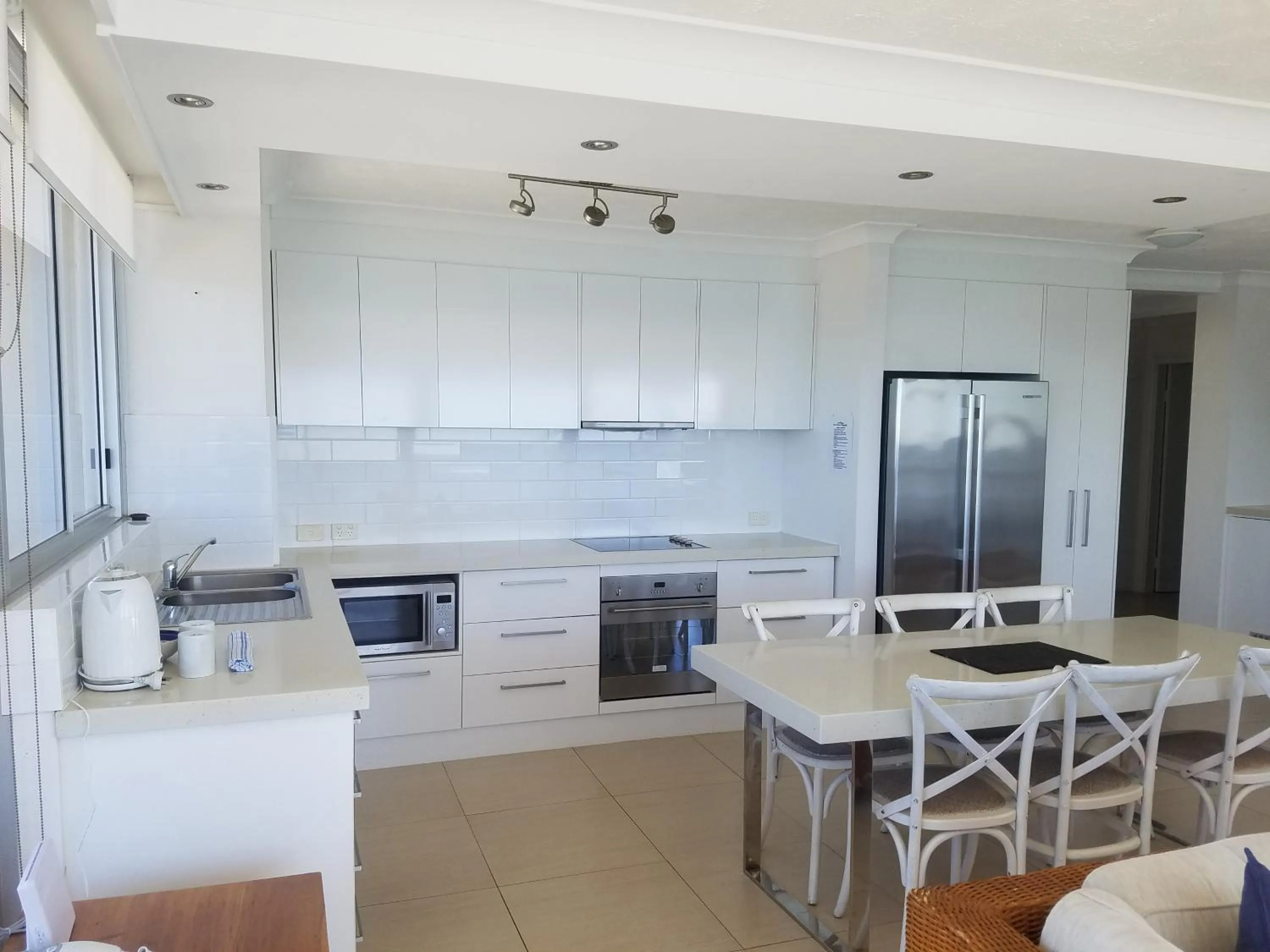 Kitchen or kitchenette in Golden Sands on the Beach - Absolute Beachfront Apartments