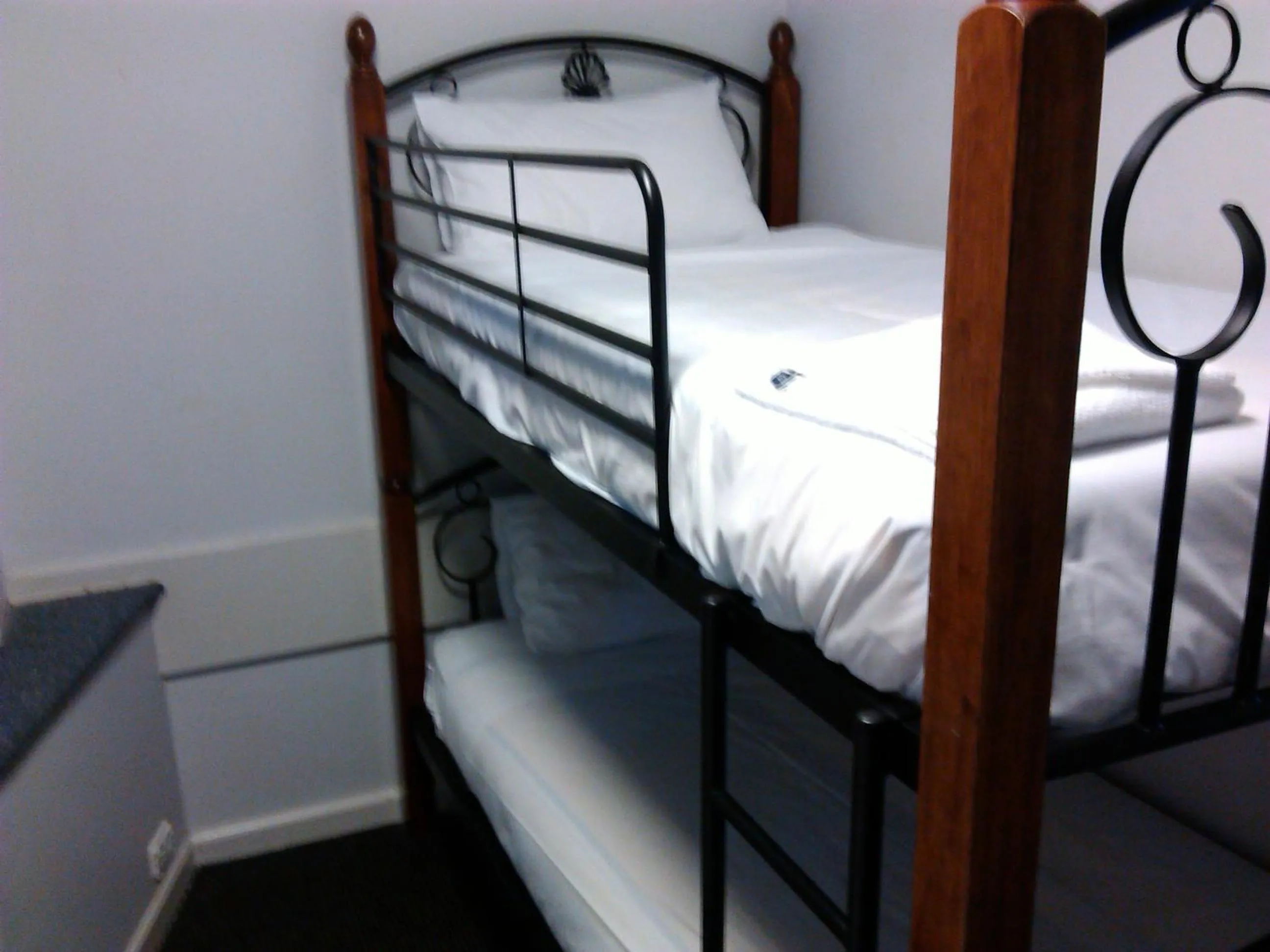 Bed in Waterfront Lodge Motel