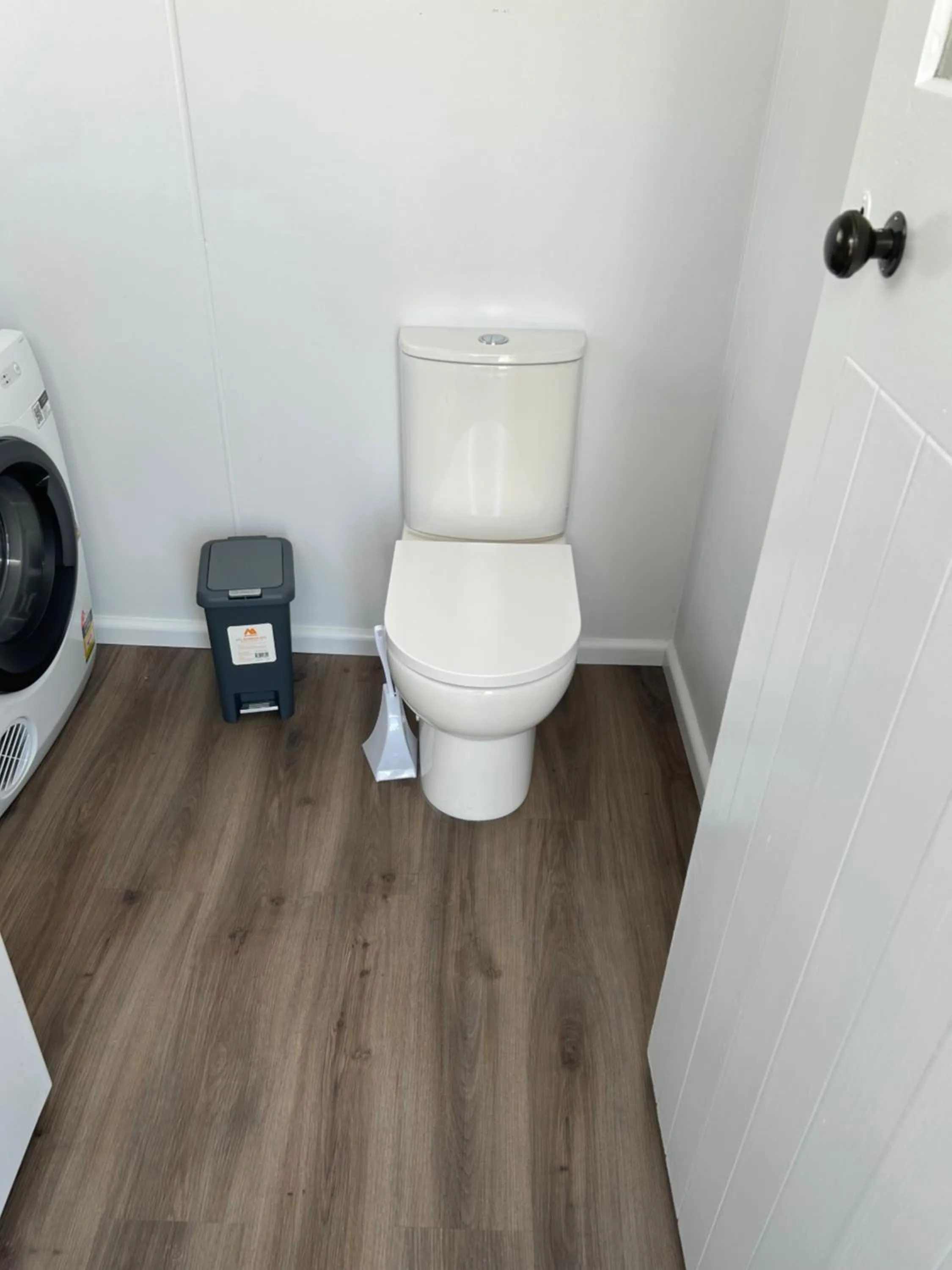 Toilet in Waterfront Lodge Motel