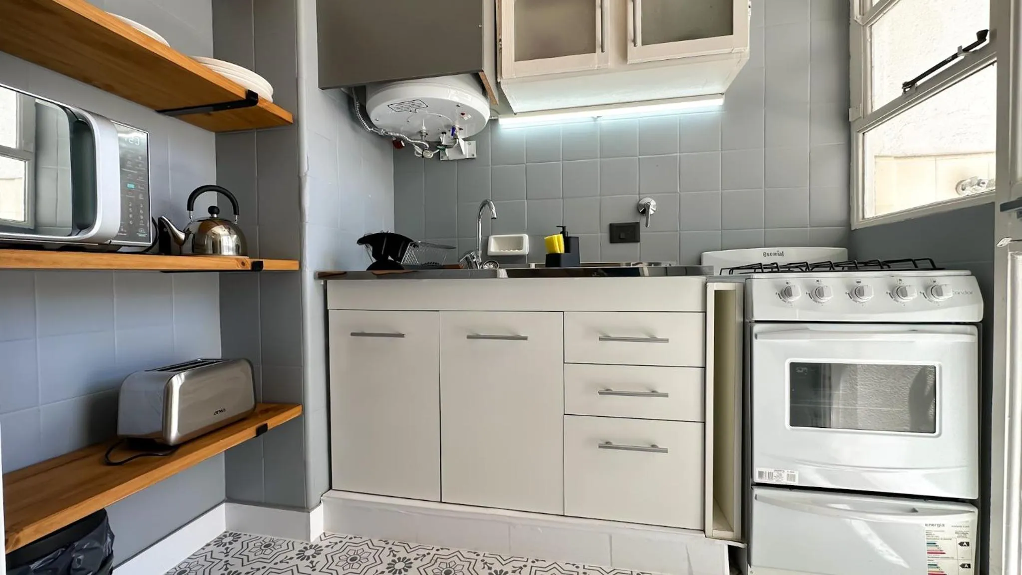 Kitchen or kitchenette in Soho Rentals