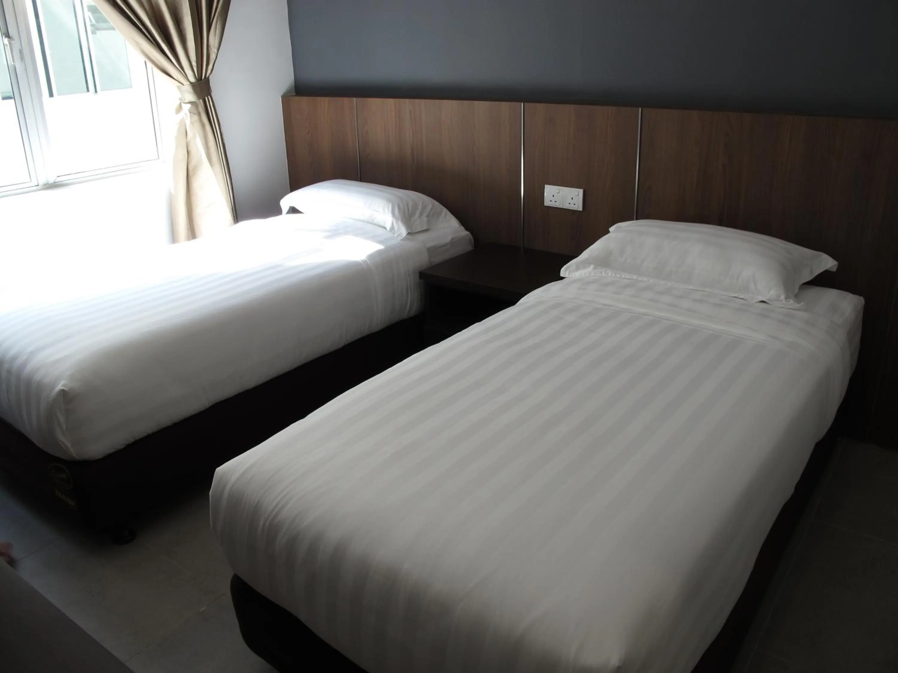 Bed in HOTEL SUKARAMAI