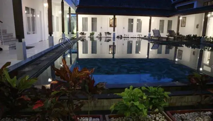 Pool view in Sinom Borobudur Heritage Hotel Pool view in Sinom Borobudur Heritage Hotel