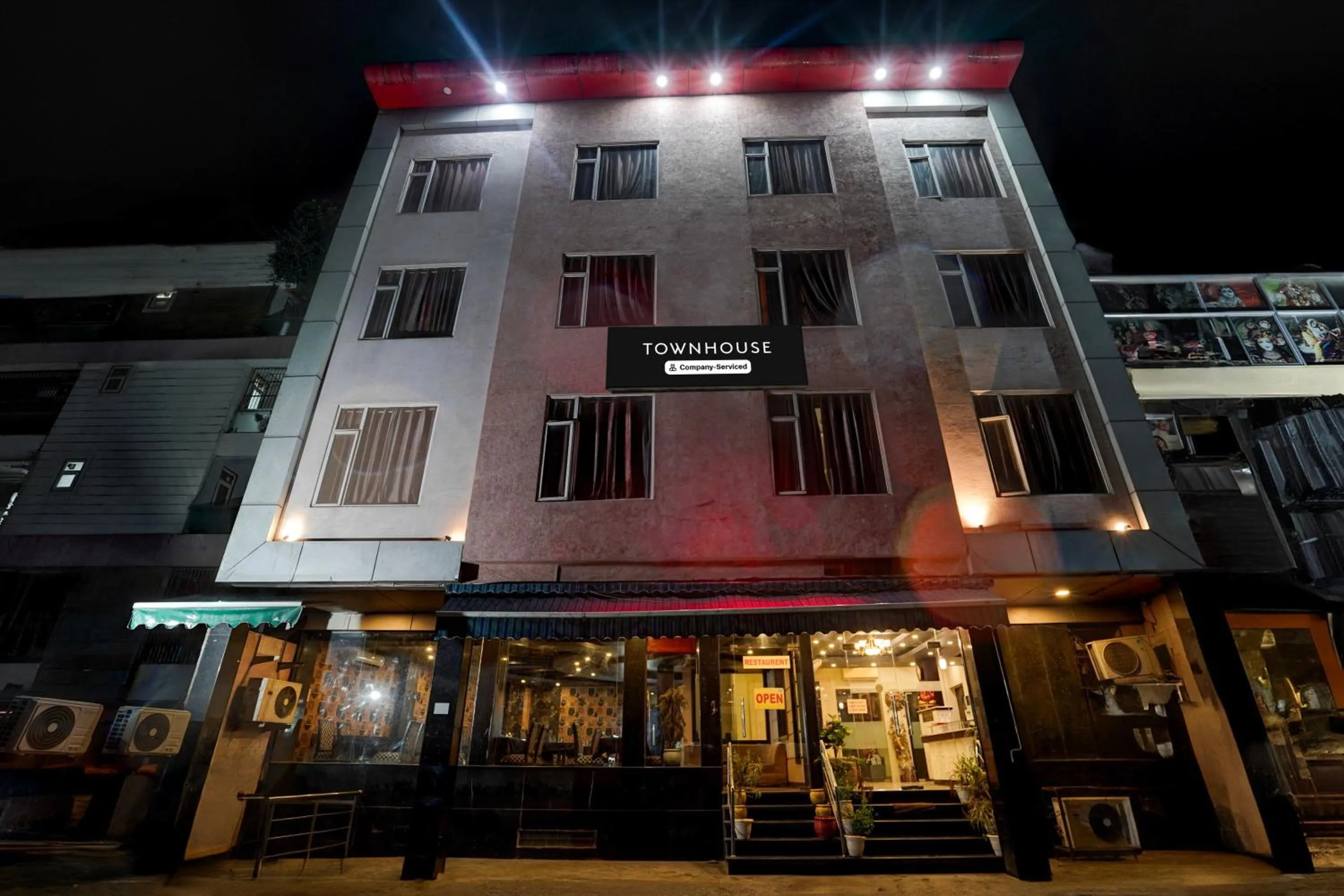 Facade/entrance in Super Townhouse Bani Park Formerly Aroma Residency