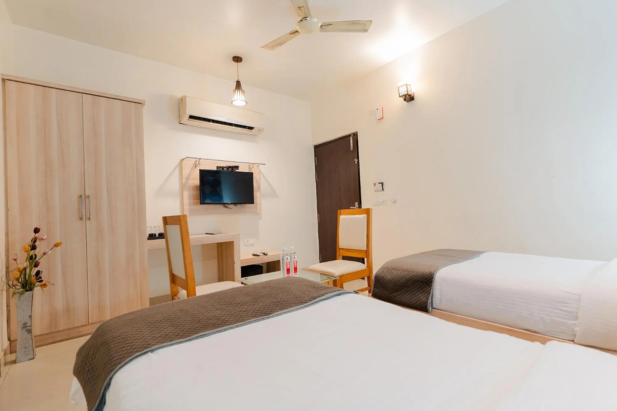 Bed in FabHotel Signature Inn