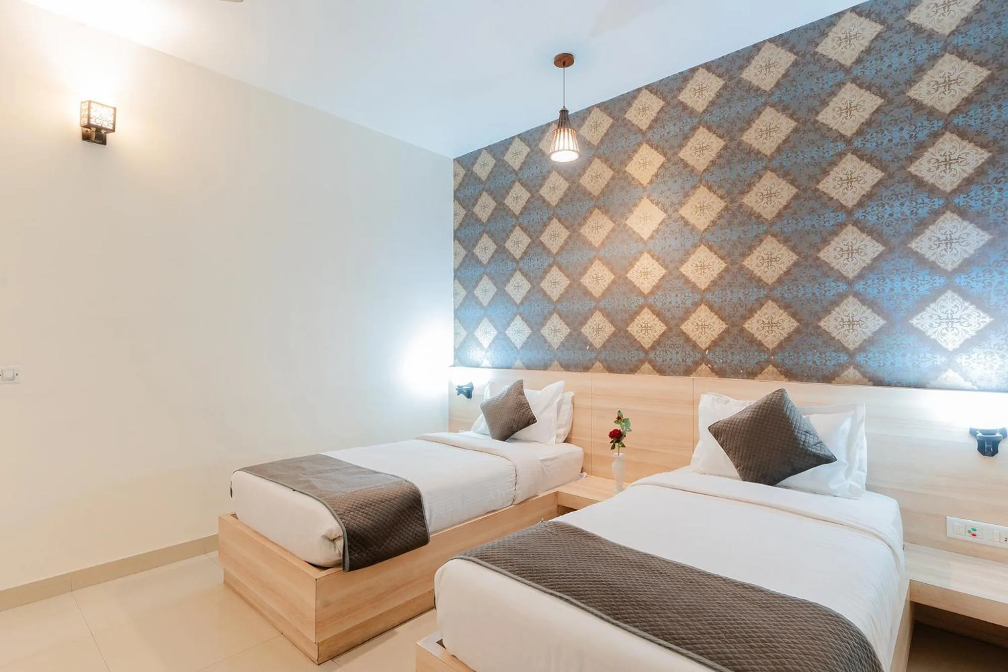 Bed in FabHotel Signature Inn