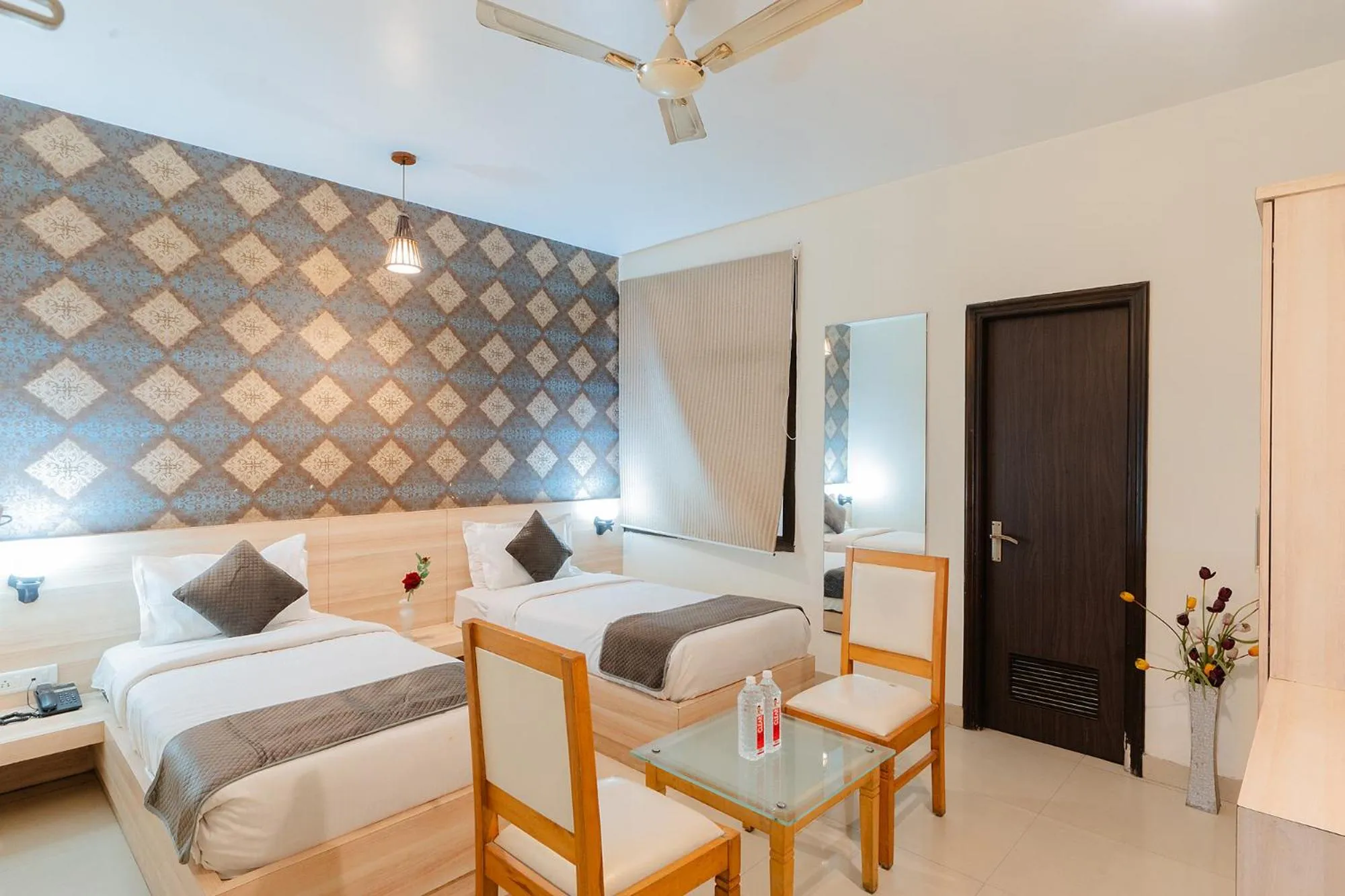 Bed in FabHotel Signature Inn