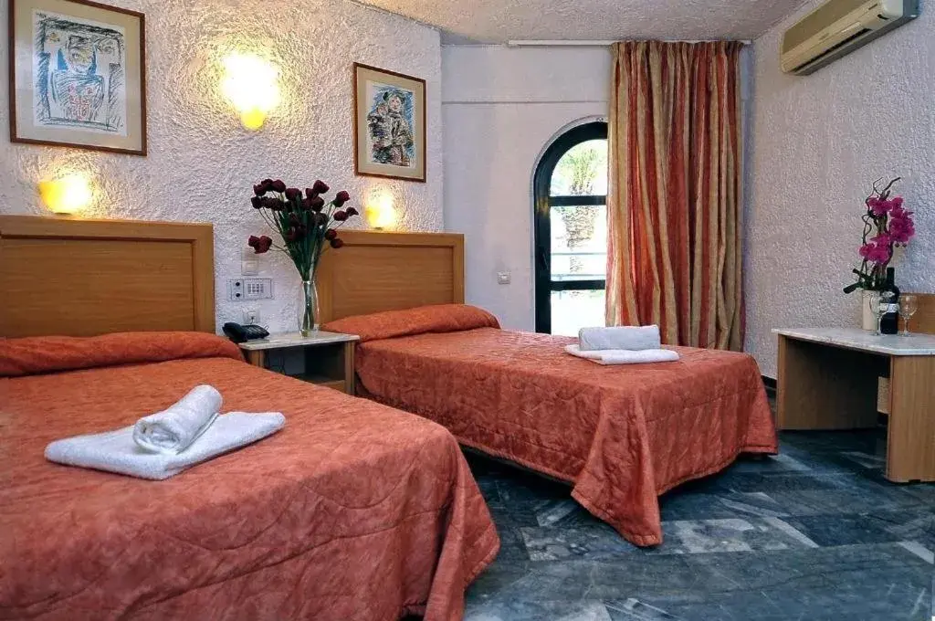 Bed in Karteros Hotel Bed in Karteros Hotel