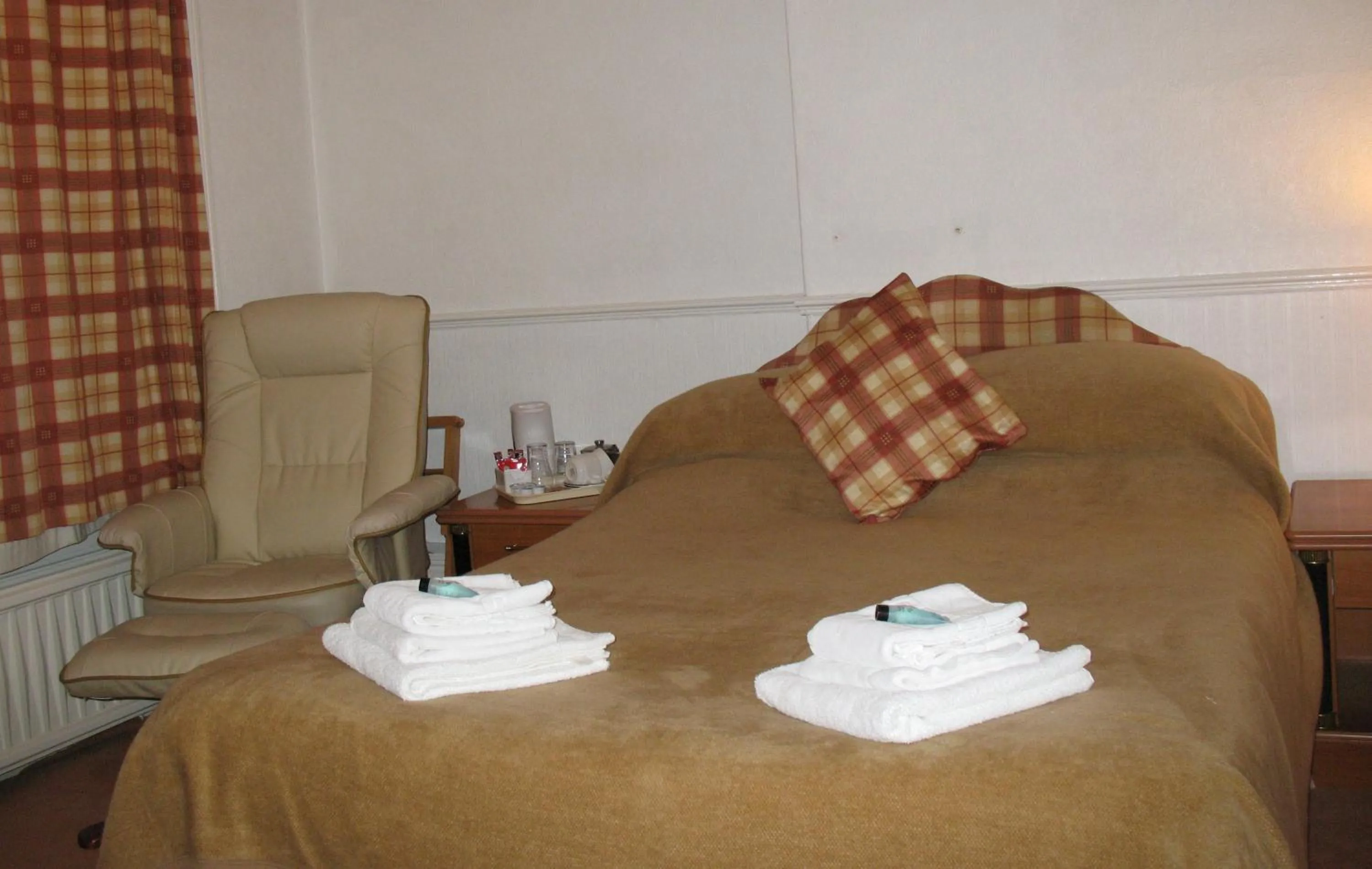 Bed in Michaelson House Hotel