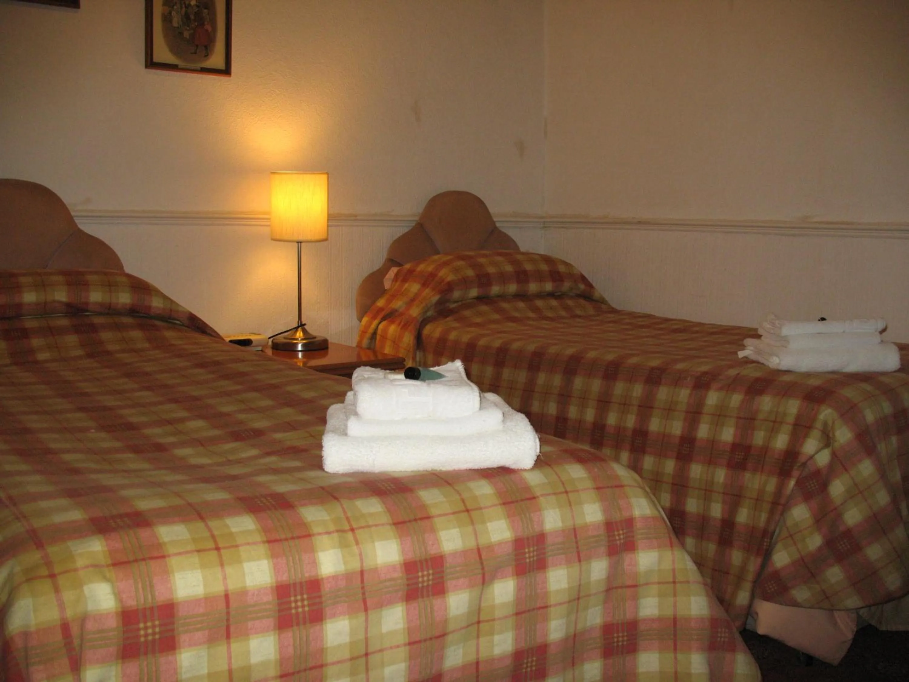 Bed in Michaelson House Hotel