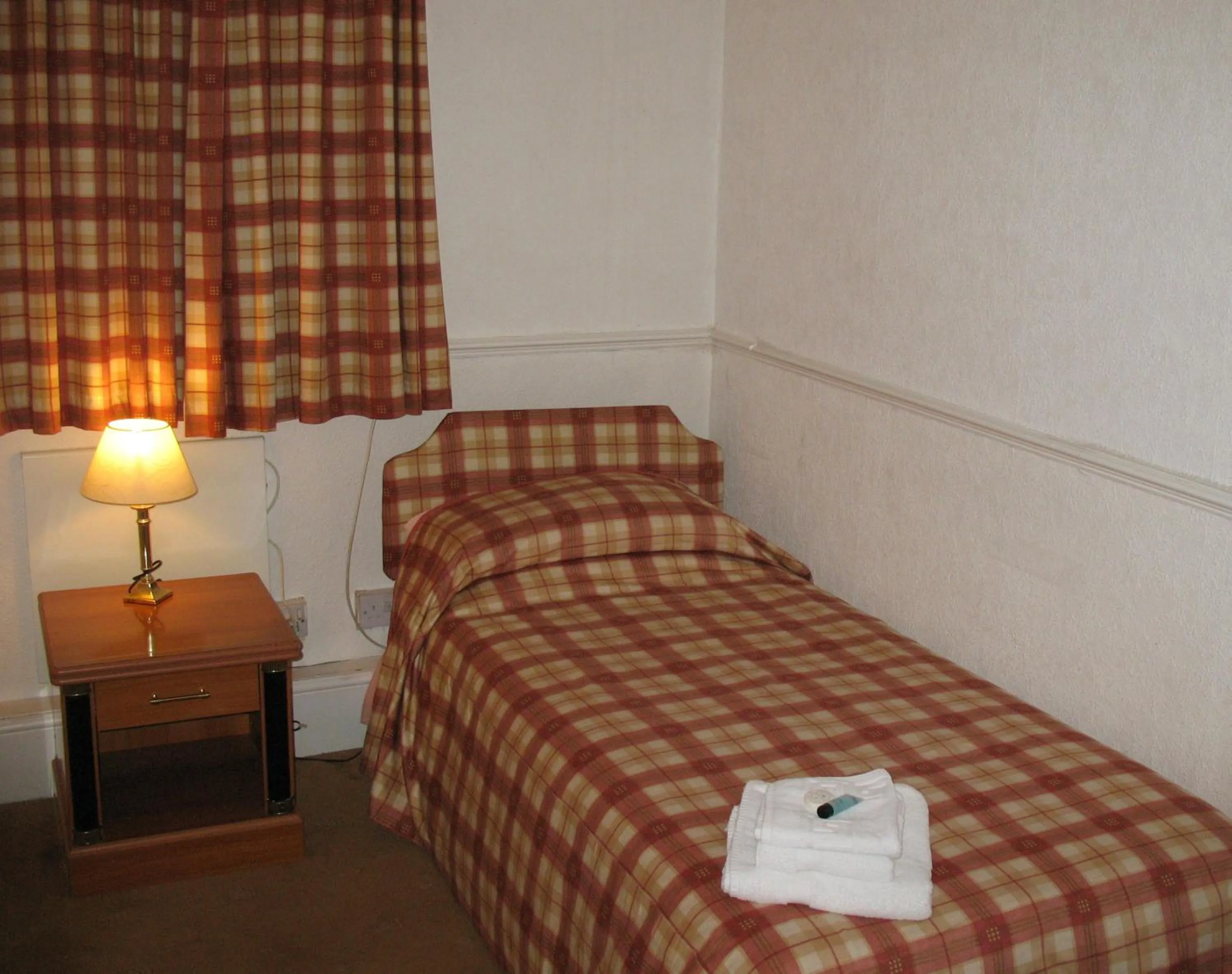 Bed in Michaelson House Hotel