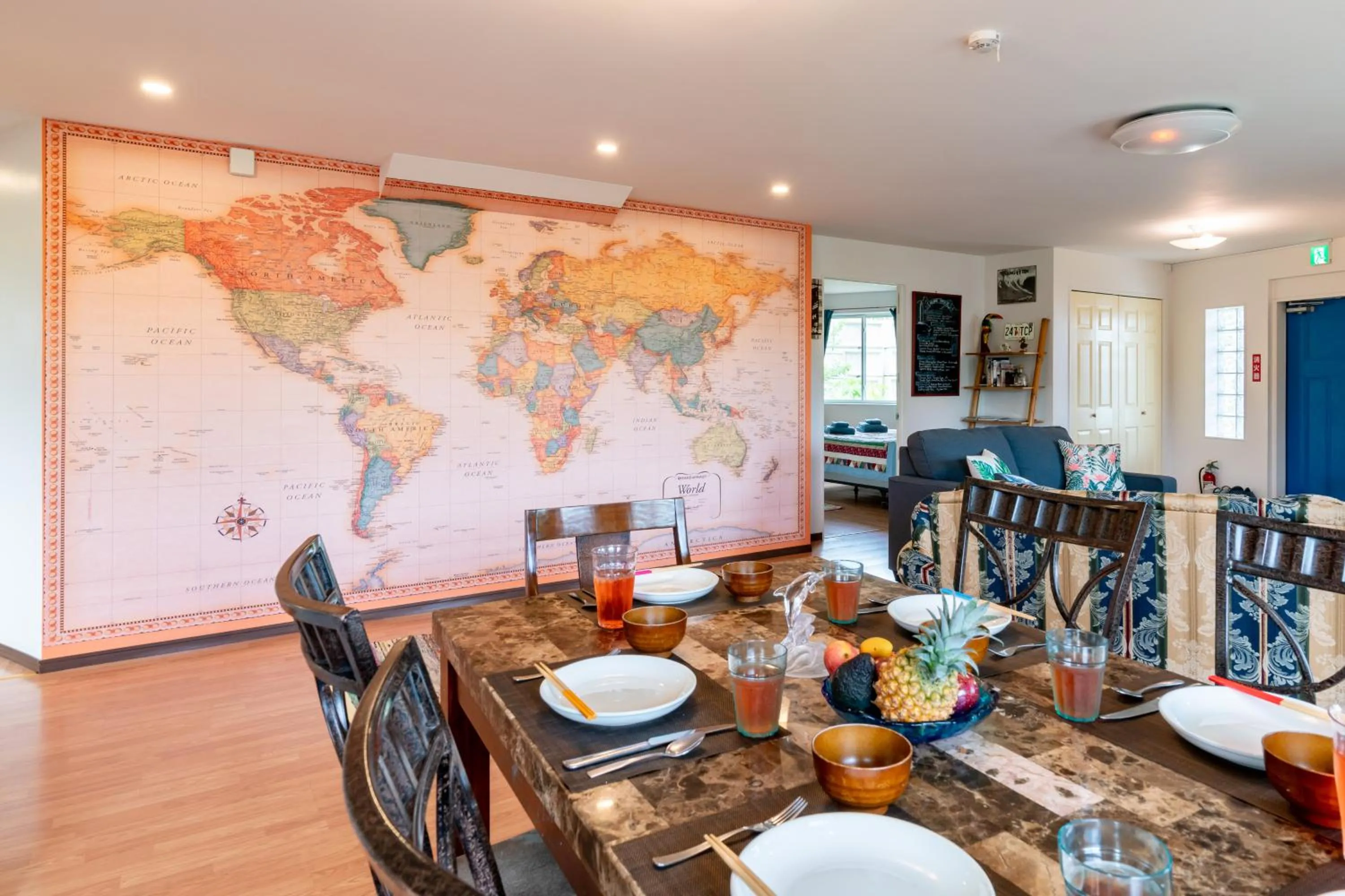 Dining area in Island Breeze - Round House with BBQ - Wooden Hot Tub - Beach
