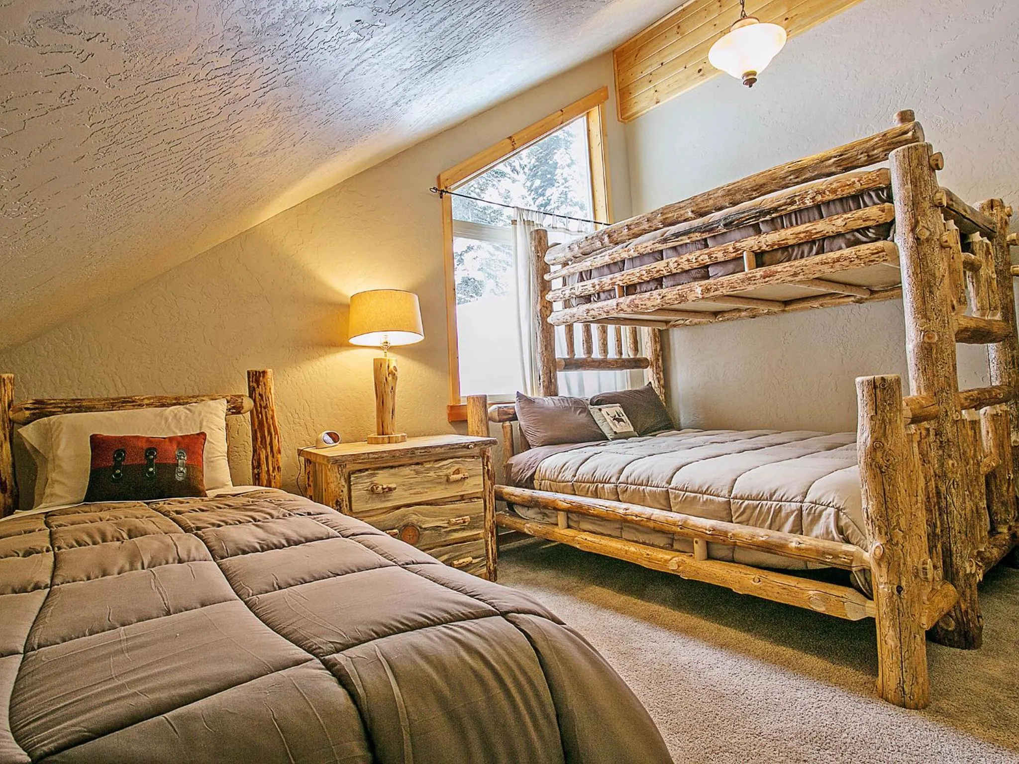 Bed in Spacious Sandpoint Chalet with Hot Tub Views