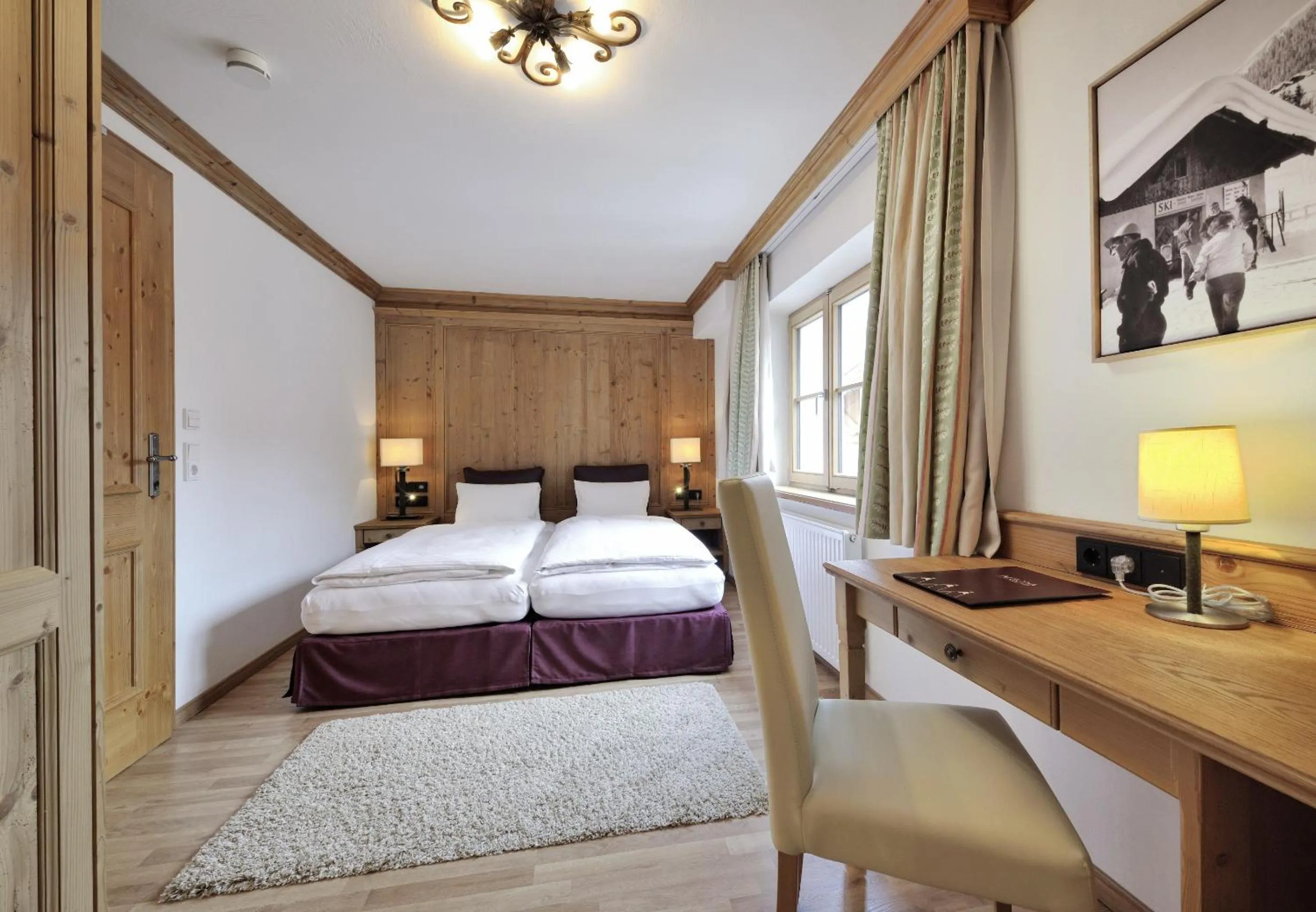 Bedroom in Hotel Garni Albona