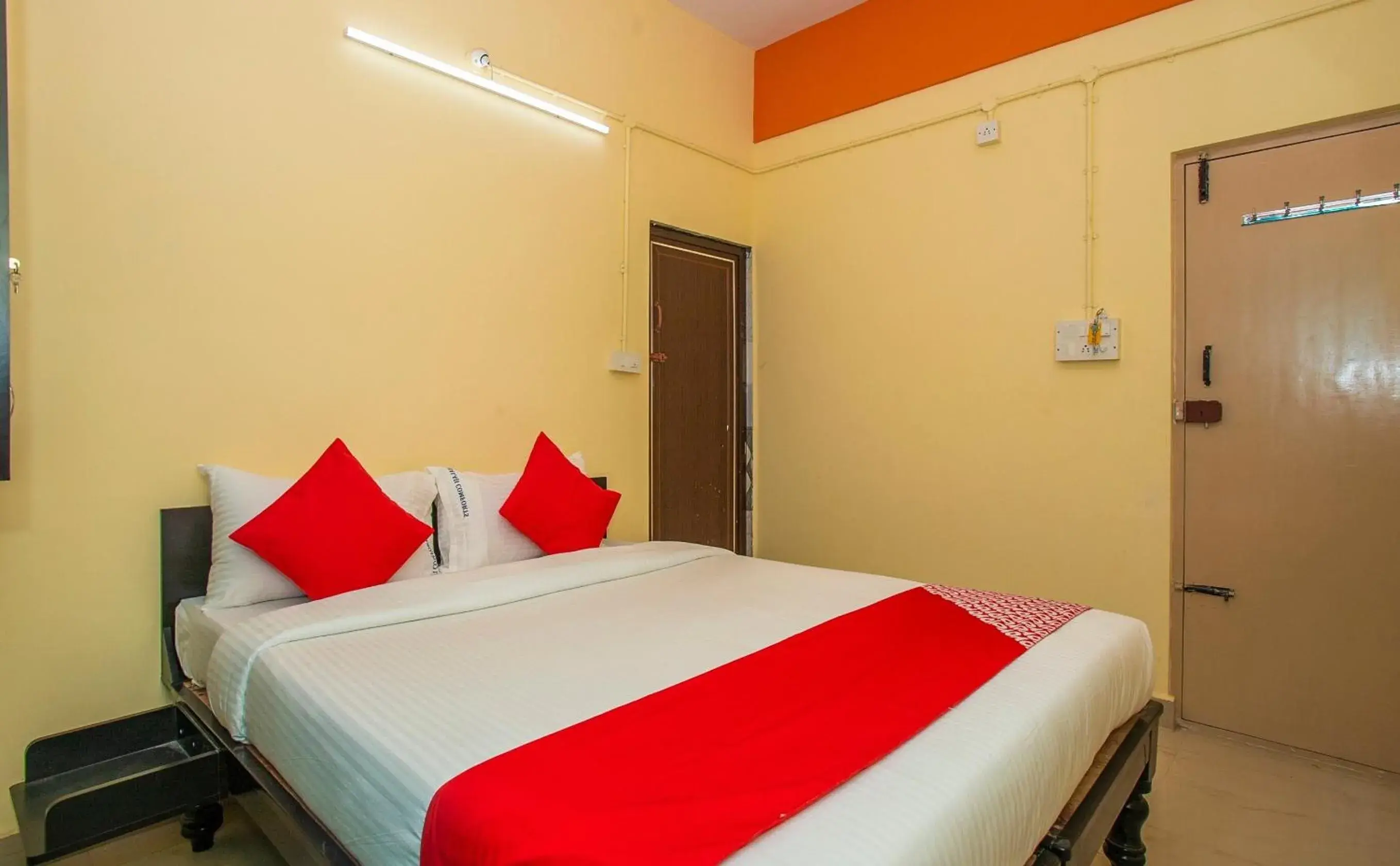 Bedroom, Bed in Hotel O Sri Hari Premium Comforts Near Sandhya Digital K Theatre Bedroom, Bed in Hotel O Sri Hari Premium Comforts Near Sandhya Digital K Theatre