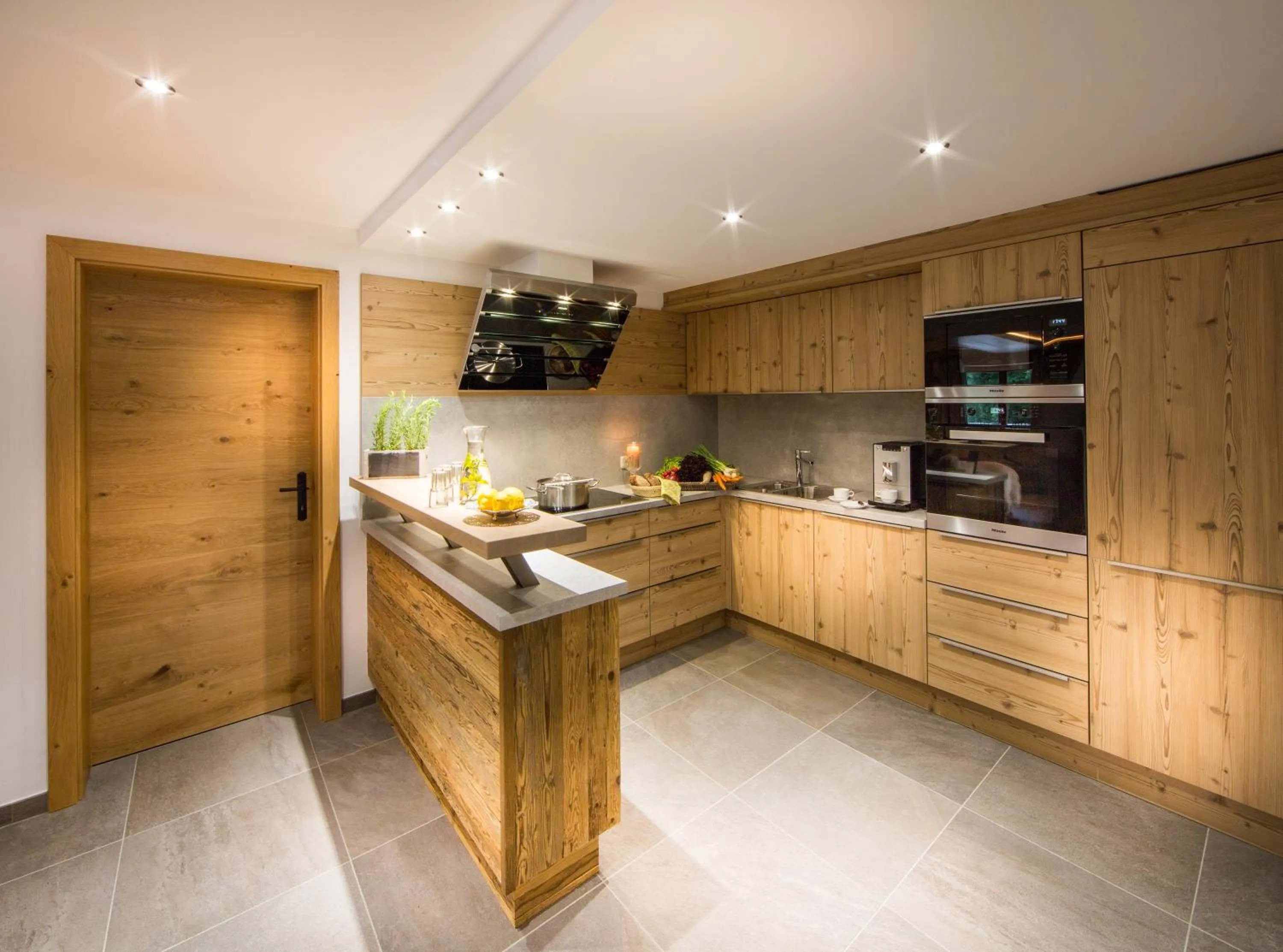 Kitchen or kitchenette in Bachgut - Das Resort am Berg