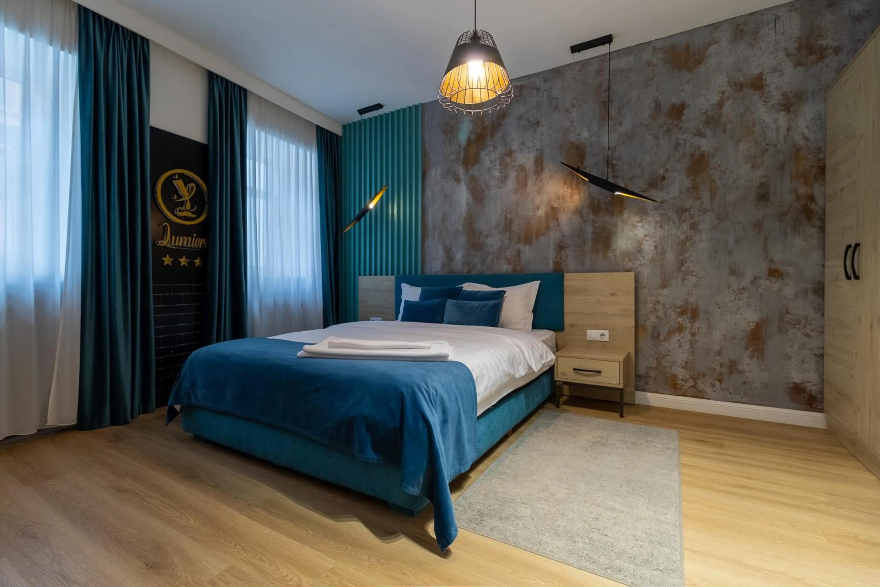 Photo of the whole room, Bed in Lumiere House Sibiu