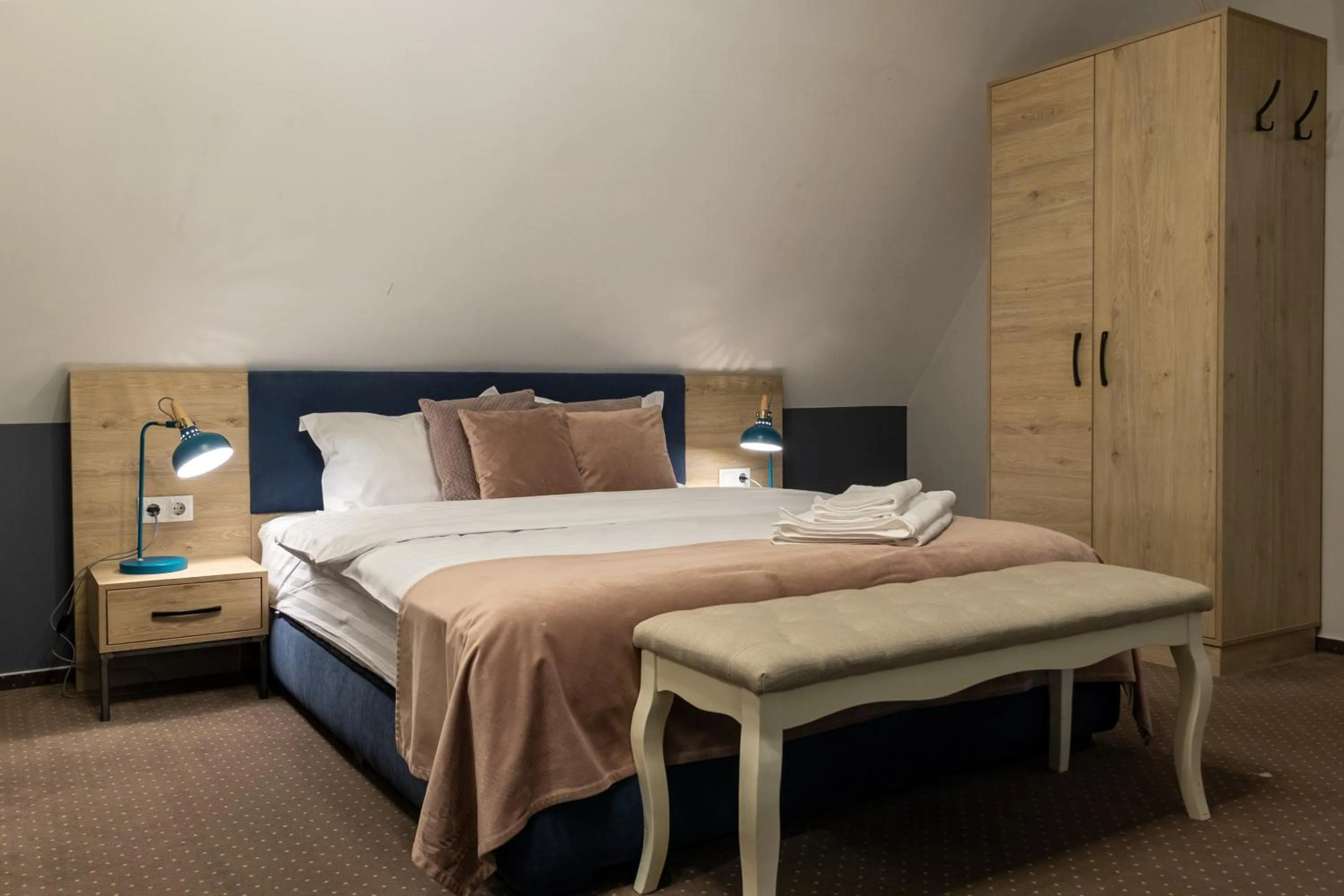 Bed in Lumiere House Sibiu
