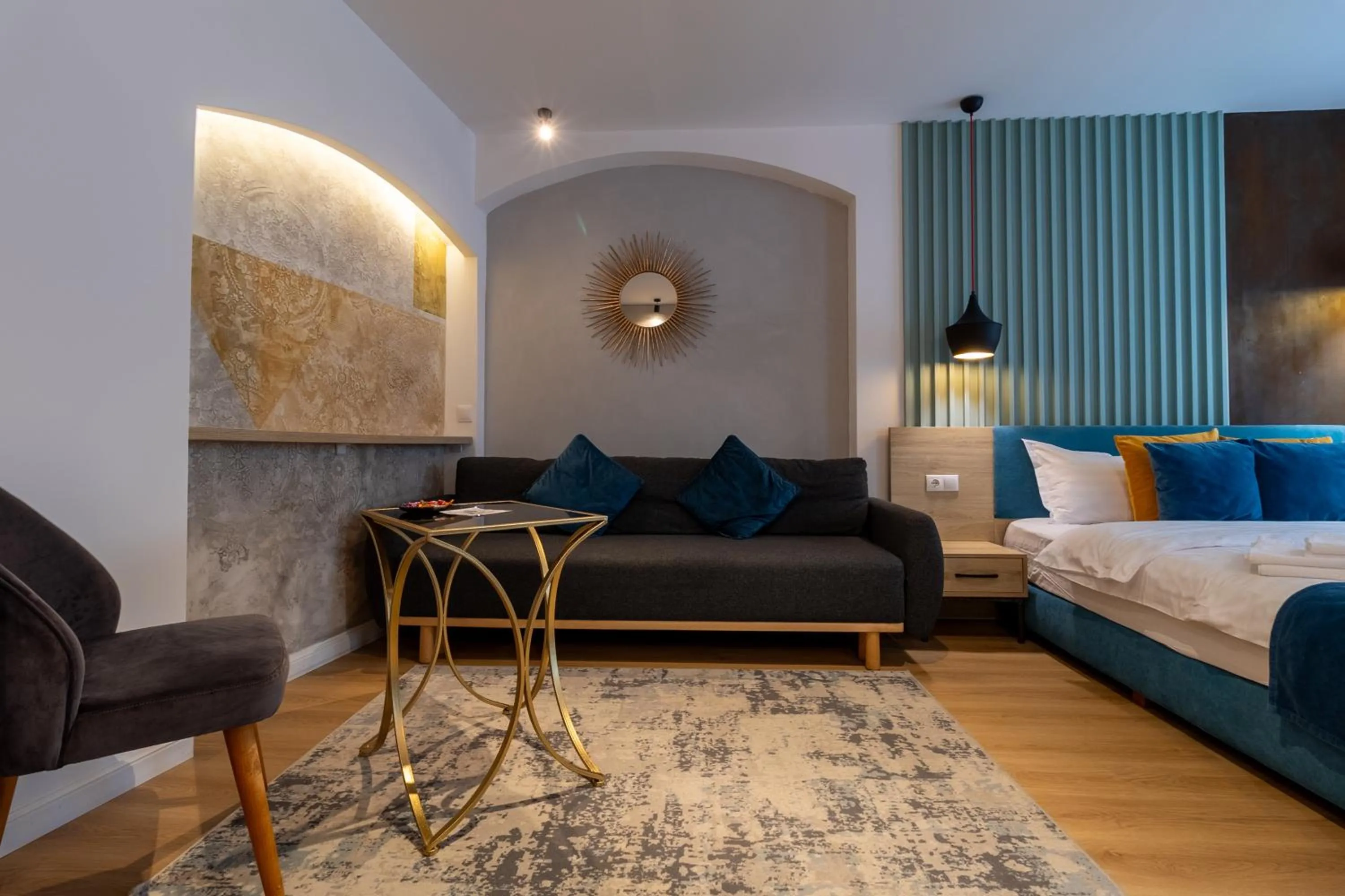 Seating area, Bed in Lumiere House Sibiu