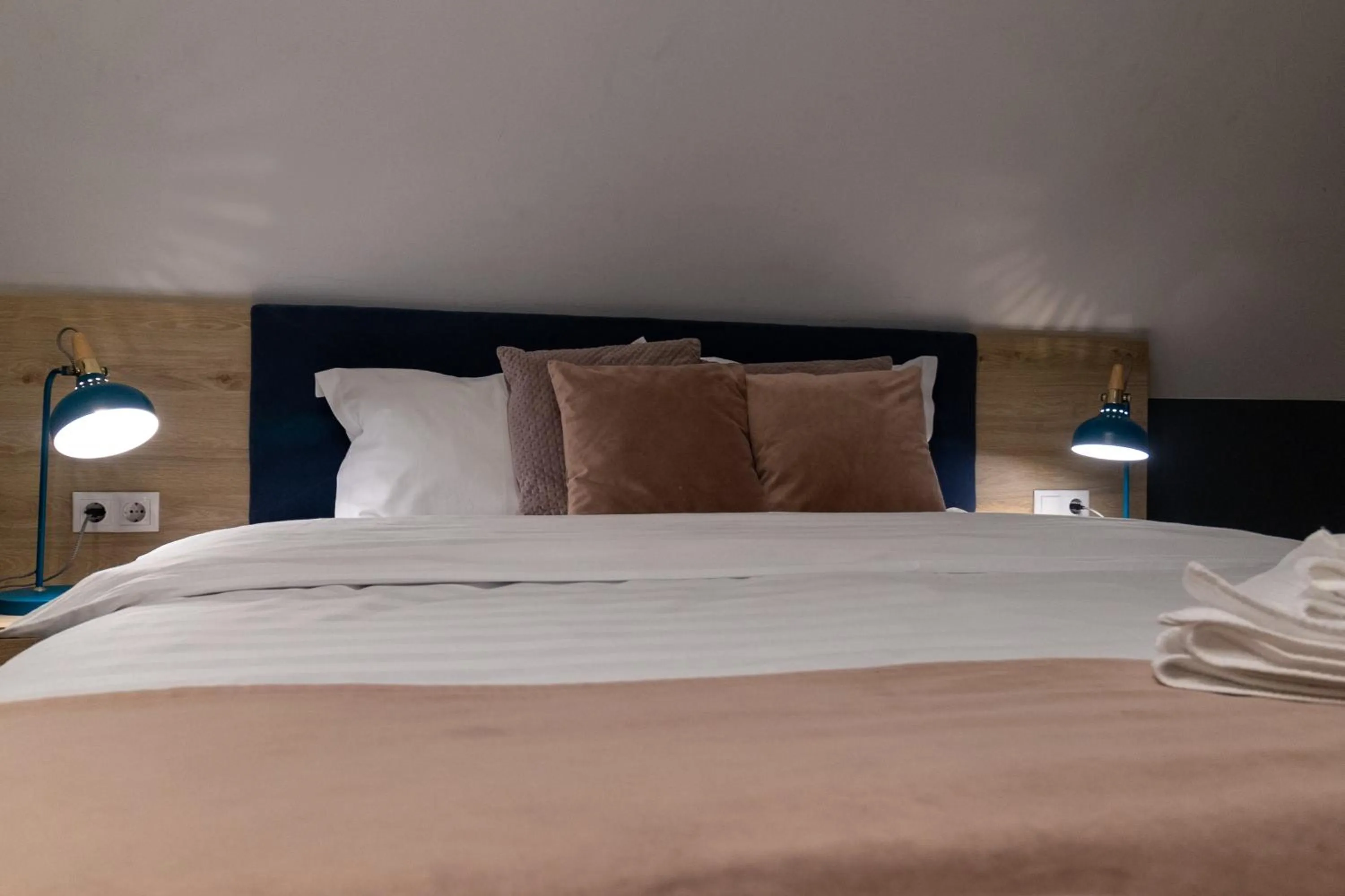 Bed in Lumiere House Sibiu