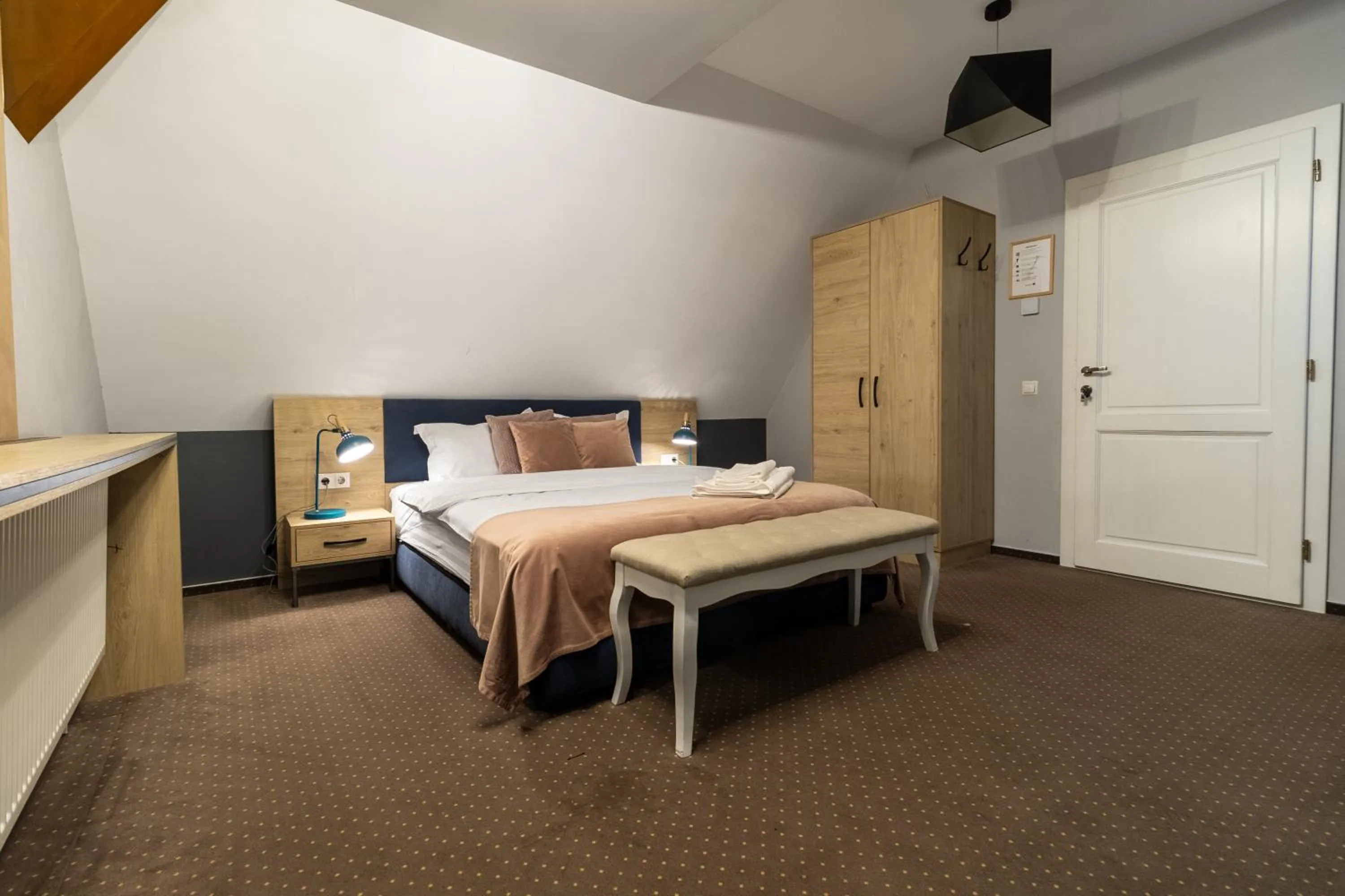 Photo of the whole room, Bed in Lumiere House Sibiu