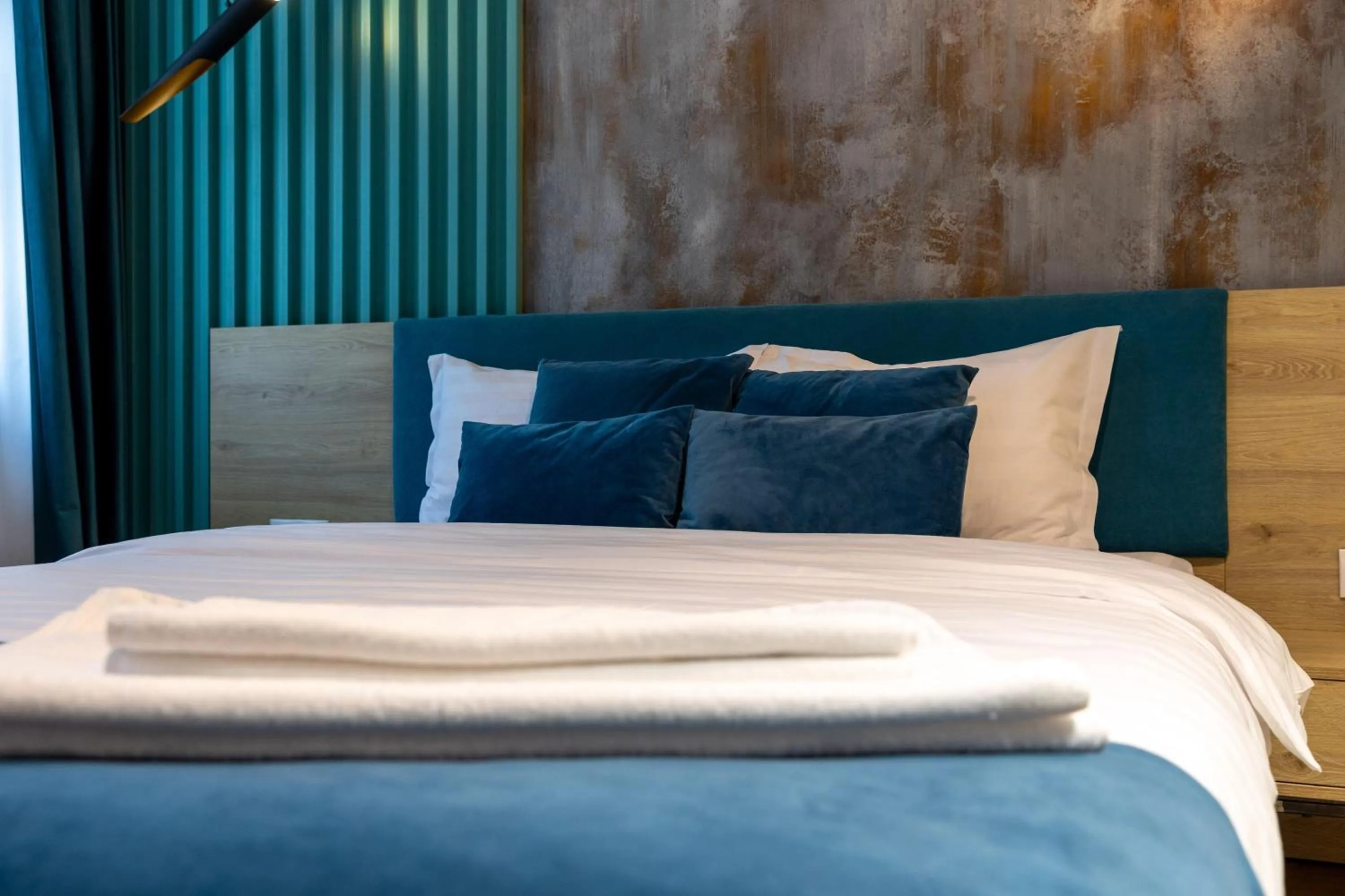 Bed in Lumiere House Sibiu