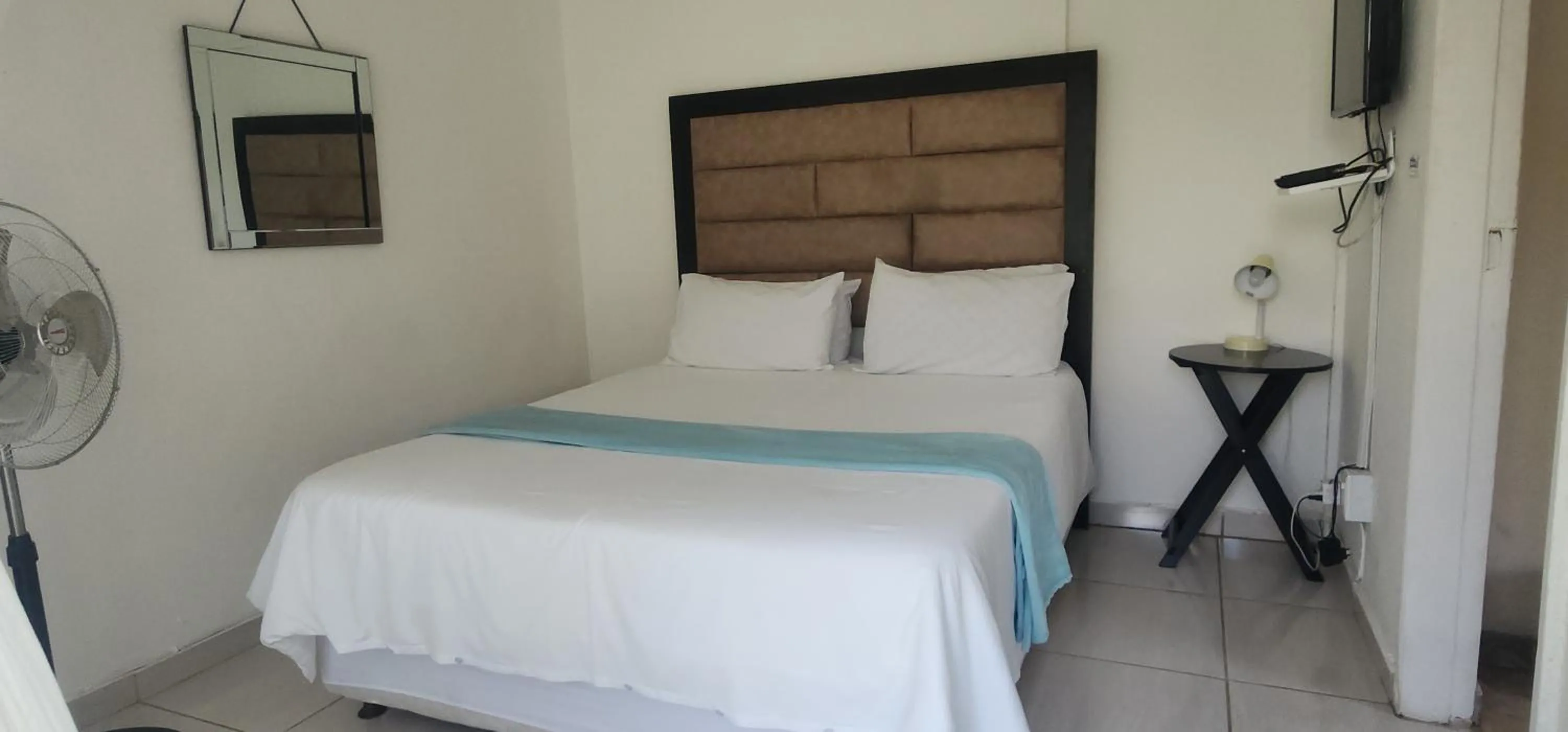 Bed in Carnival View Guest Lodge and spa