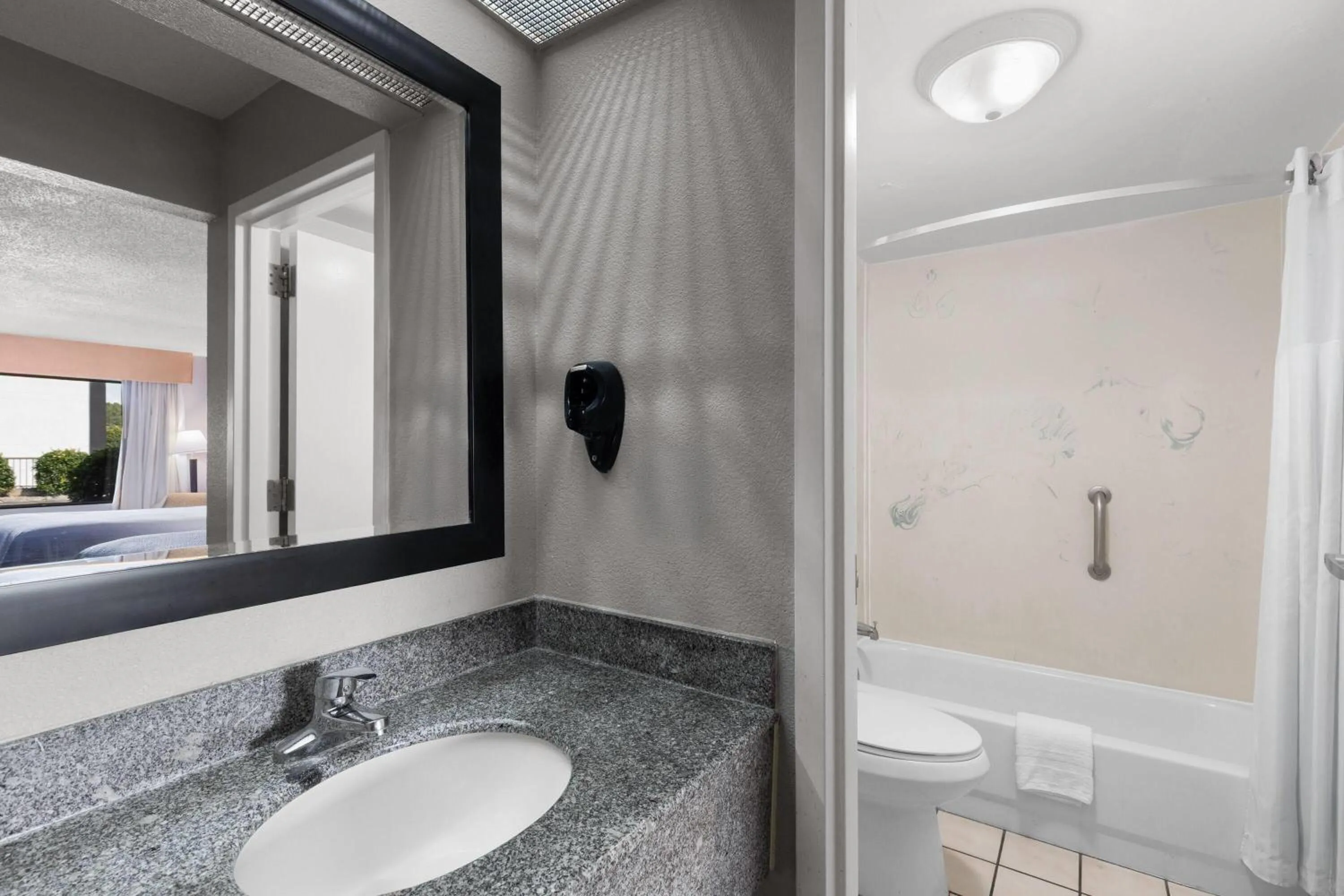 Bathroom in Super 8 by Wyndham Bulls Gap Greeneville Area