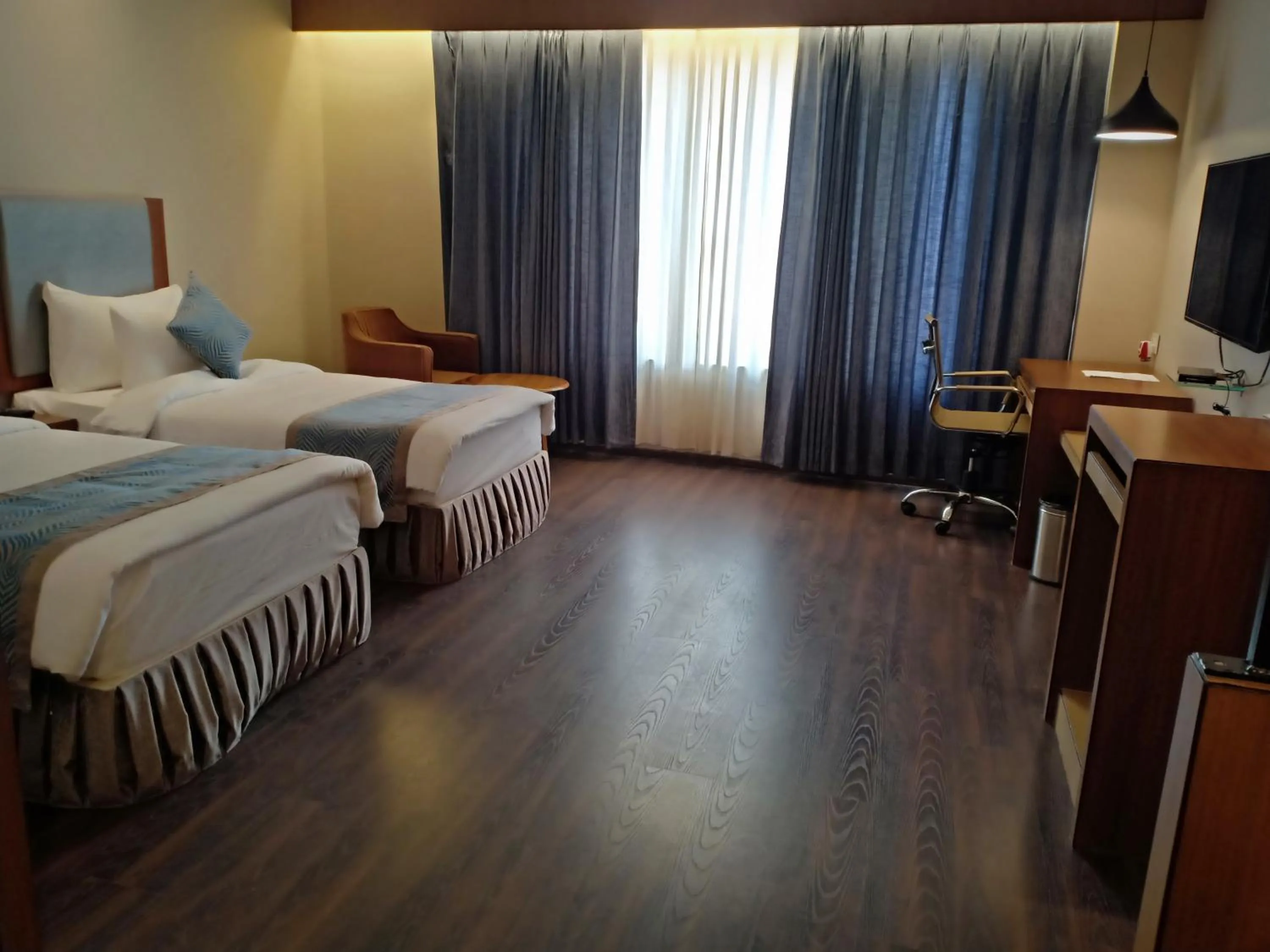 Photo of the whole room, Bed in Pipul Padmaja Premium Hotel