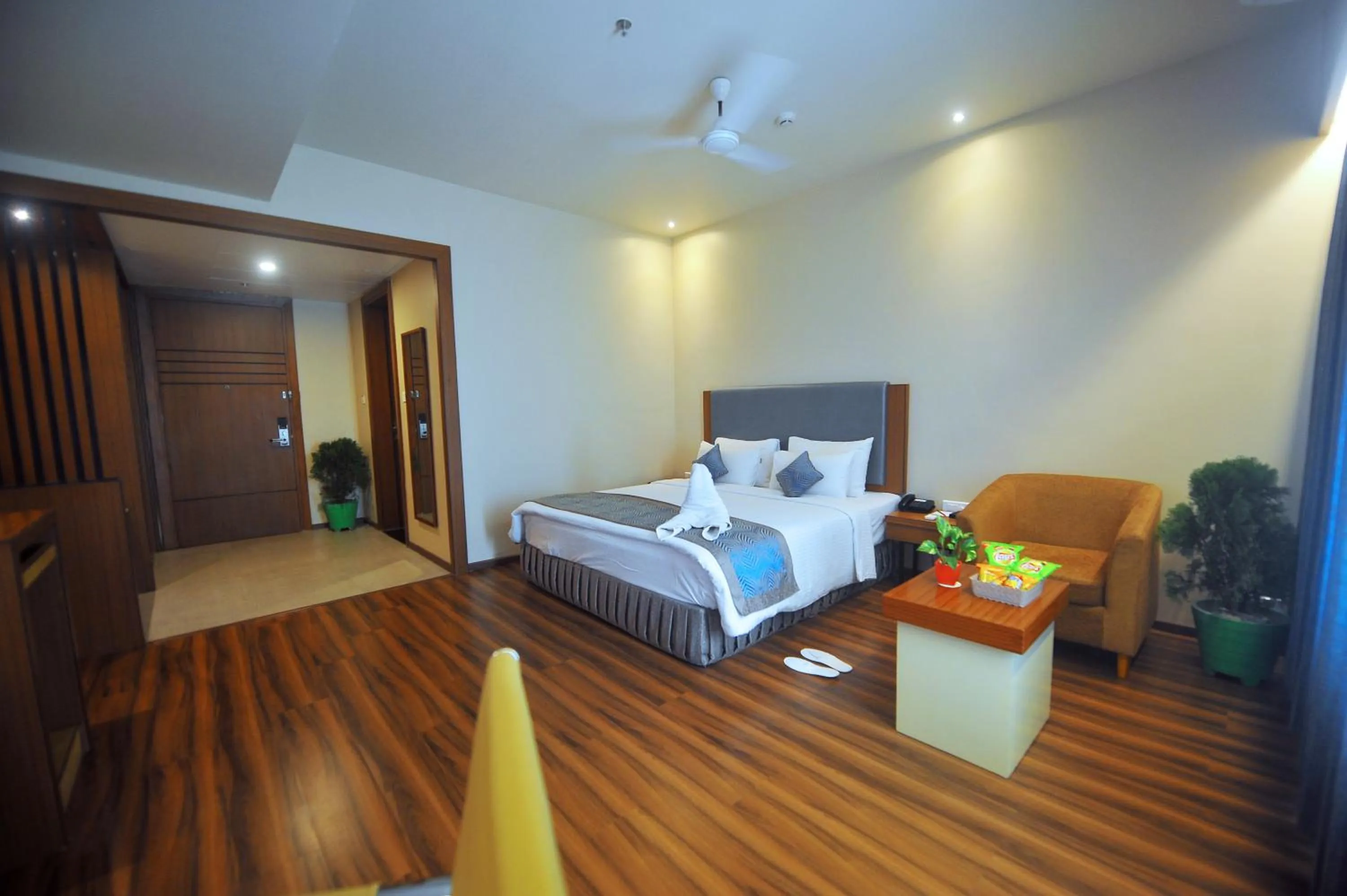 Bed in Pipul Padmaja Premium Hotel