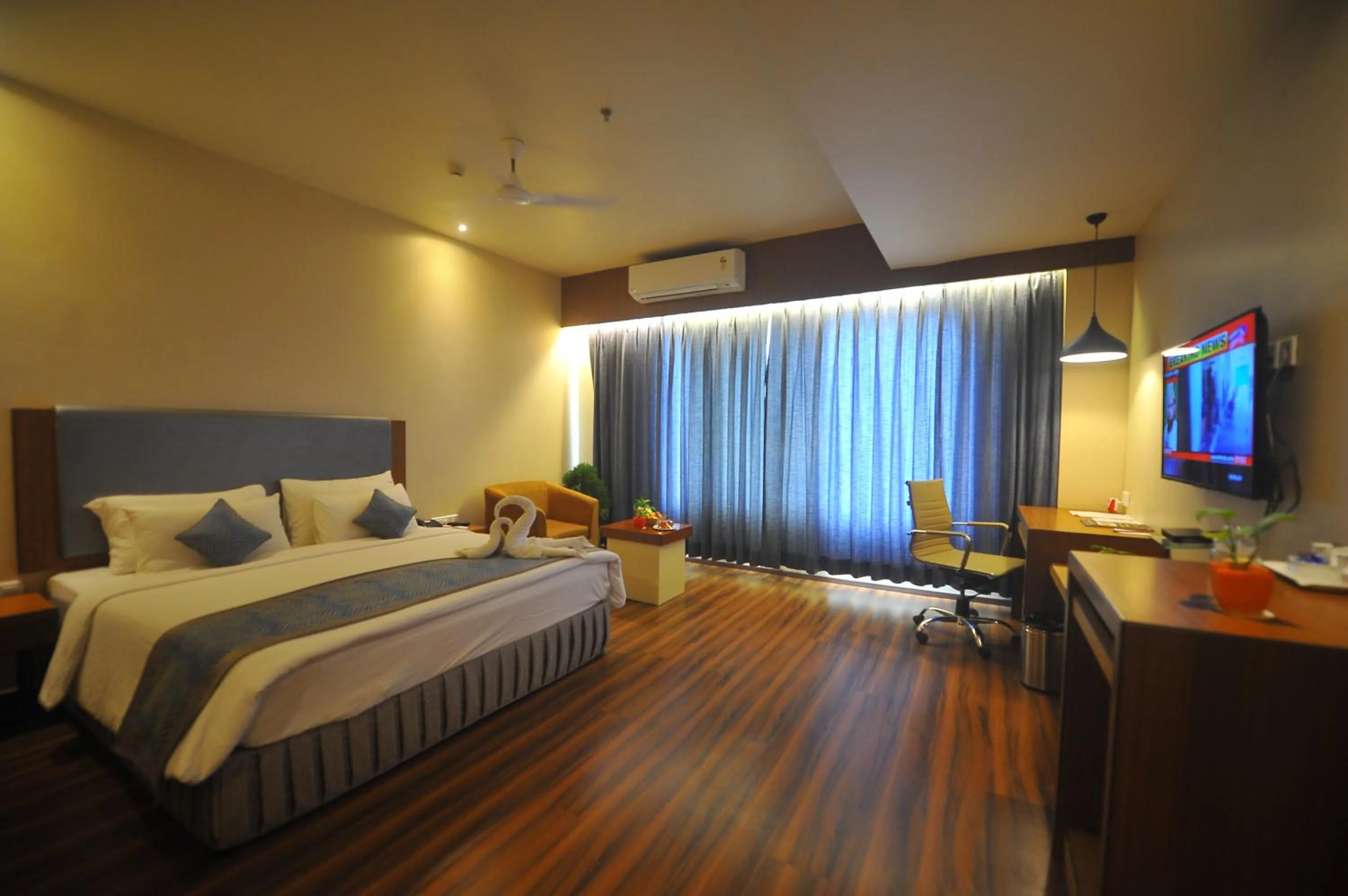 Bed in Pipul Padmaja Premium Hotel