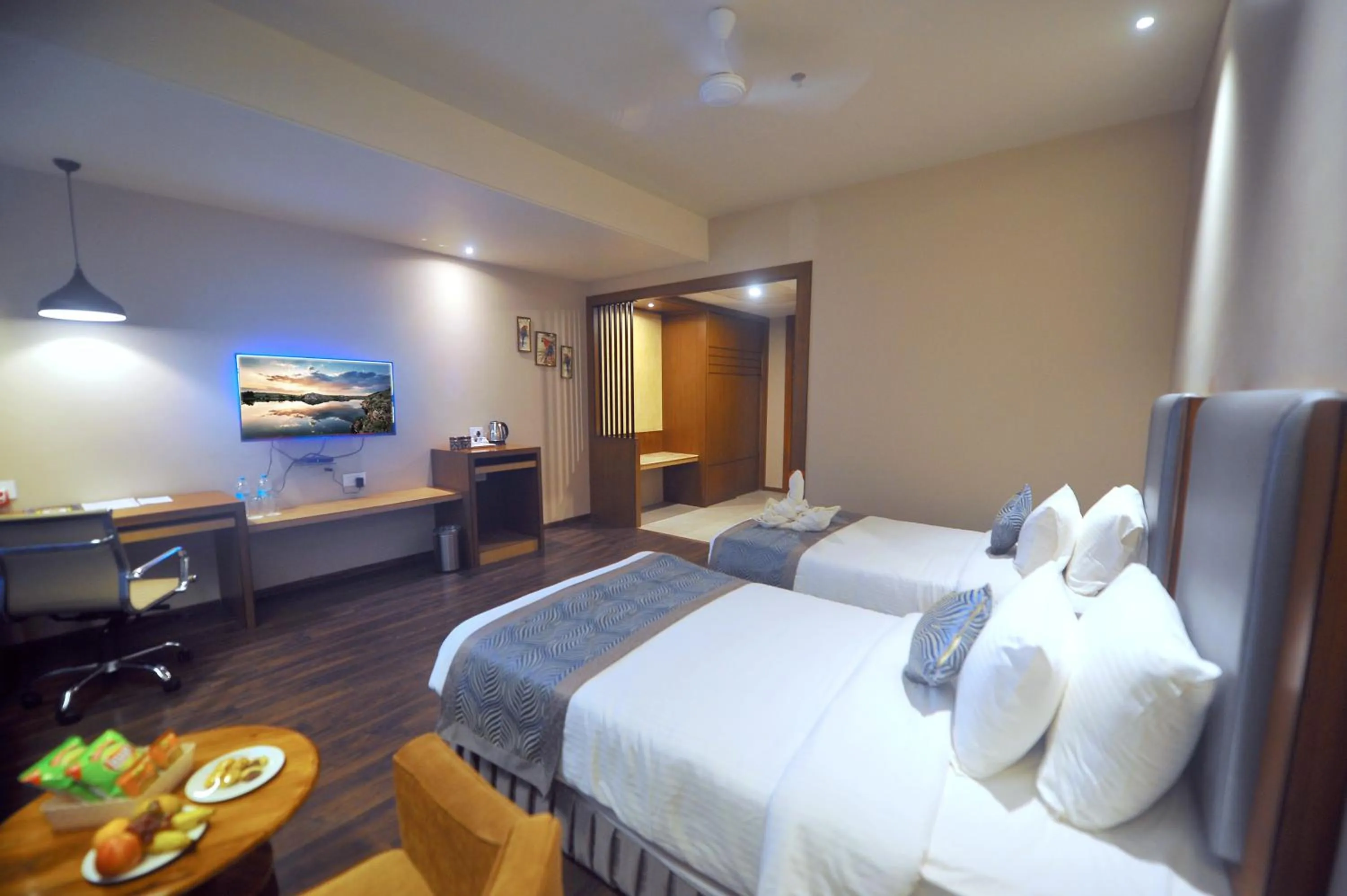 Bed in Pipul Padmaja Premium Hotel