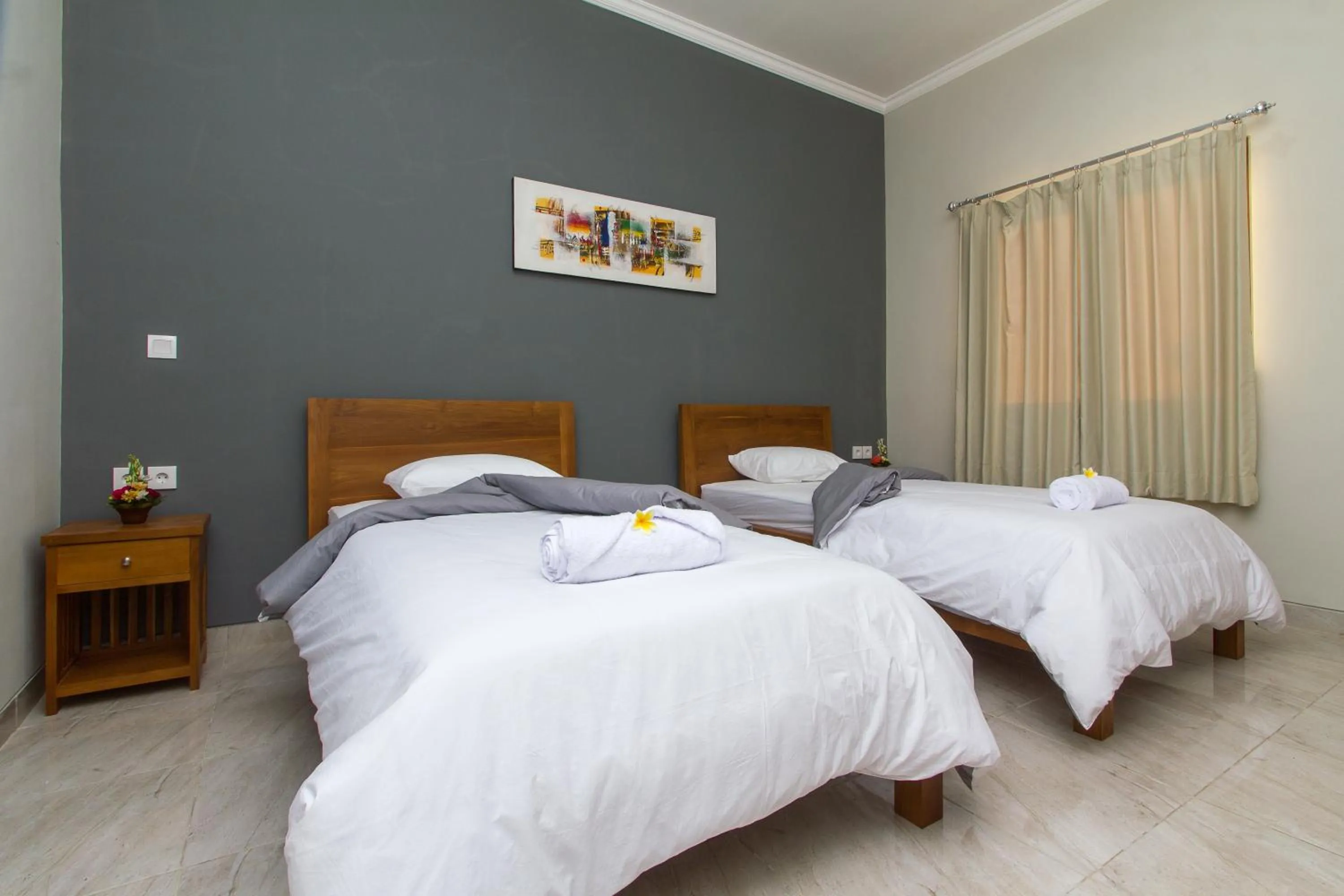 Bed in The Uma Guesthouse
